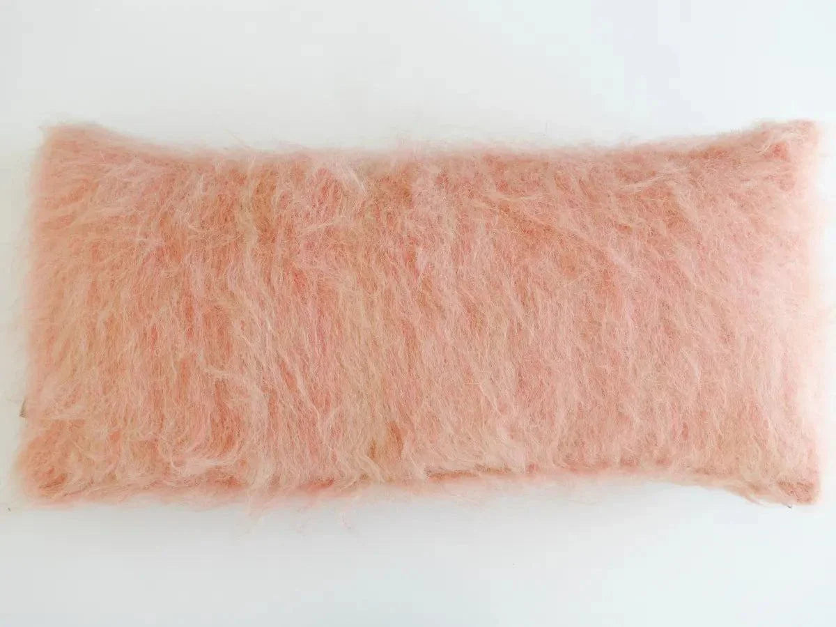 Pink handwoven wool pillow with brushed texture and natural Carpathian sheep wool craftsmanship