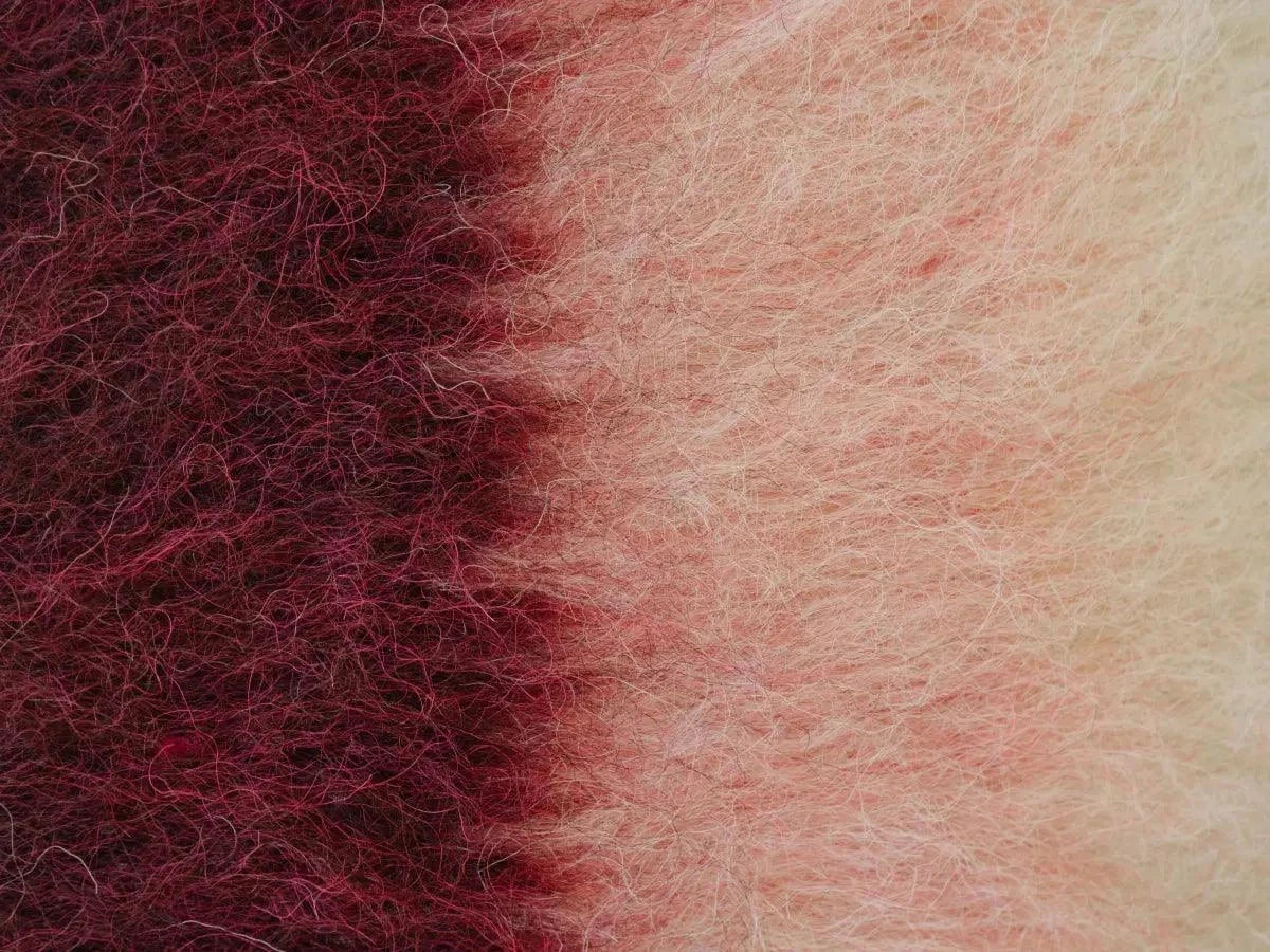 Burgundy pink and cream handwoven wool pillow with brushed texture and natural wool fibers