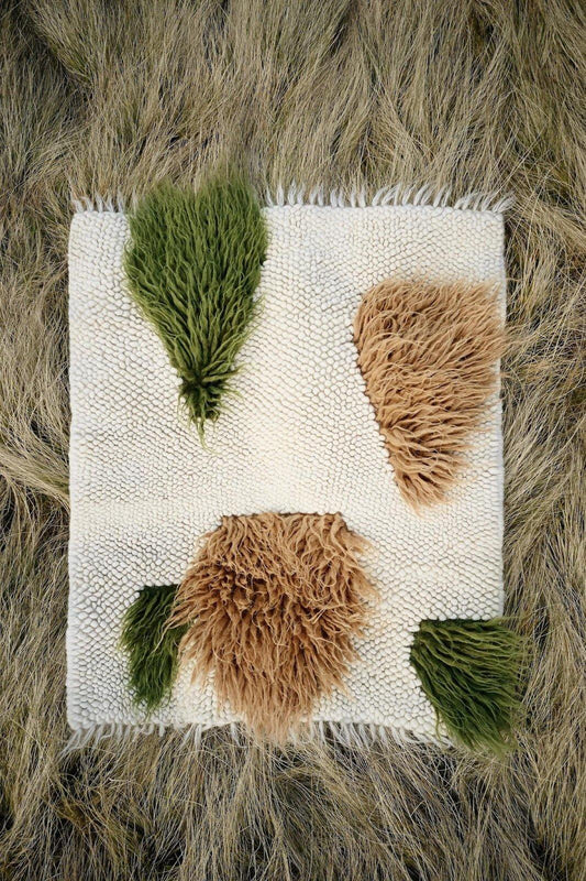 Handwoven rug Forest made from natural sheep wool with earthy tones and traditional weaving technique