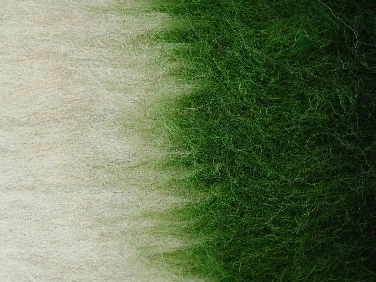 Emerald, green, and cream handwoven wool pillow with brushed texture and traditional craftsmanship