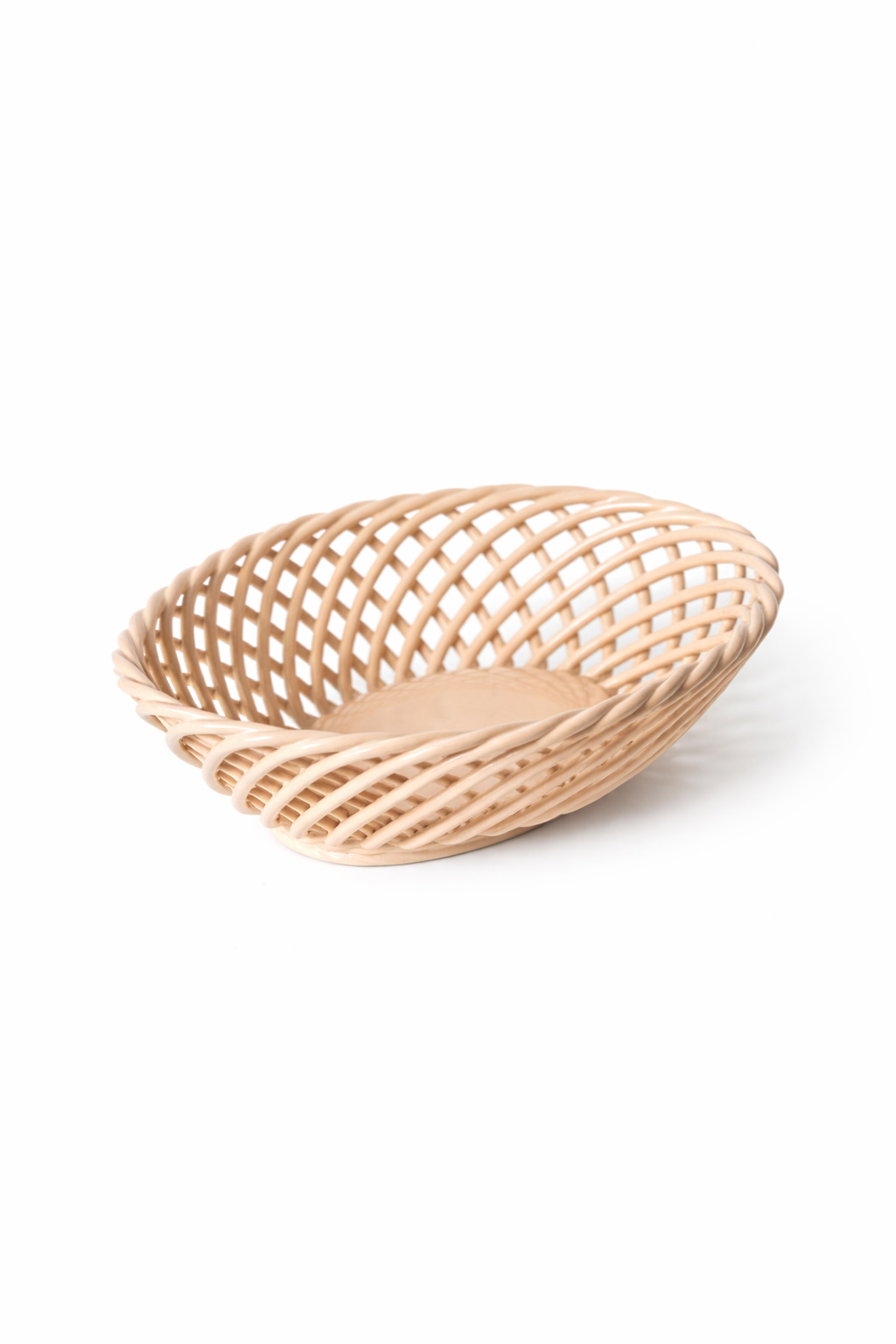 Hand-Woven Ceramic Basket in pale beige porcelain, with an oval shape and airy interlaced strips forming a woven design.