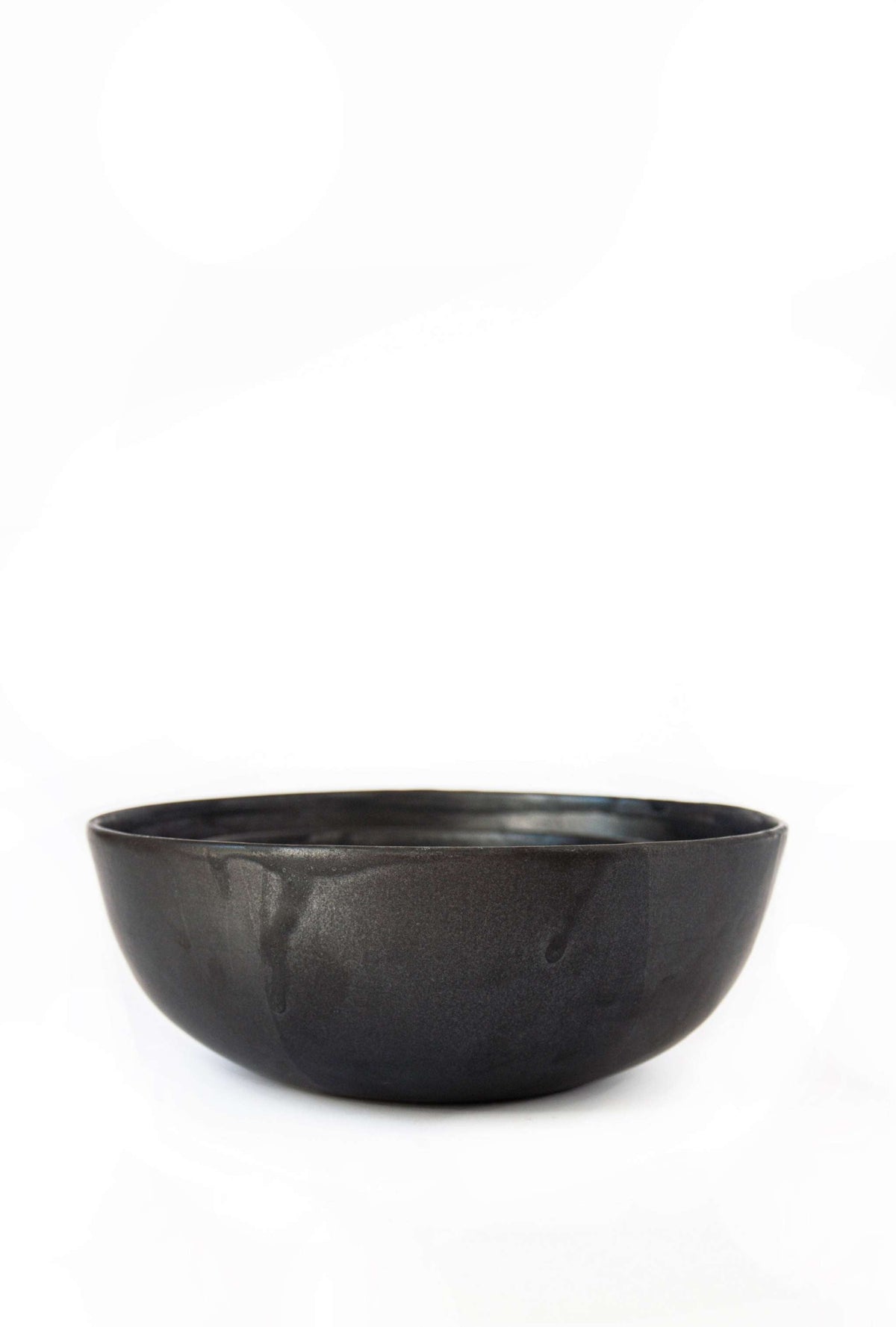 Stoneware black matte salad serving bowl with reactive glaze, handmade in Ukraine