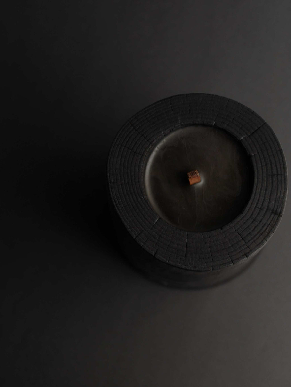 Black Illusions Wood Candle made of charred wood with multi-wick and beeswax coating for luxury aroma and sustainable burn