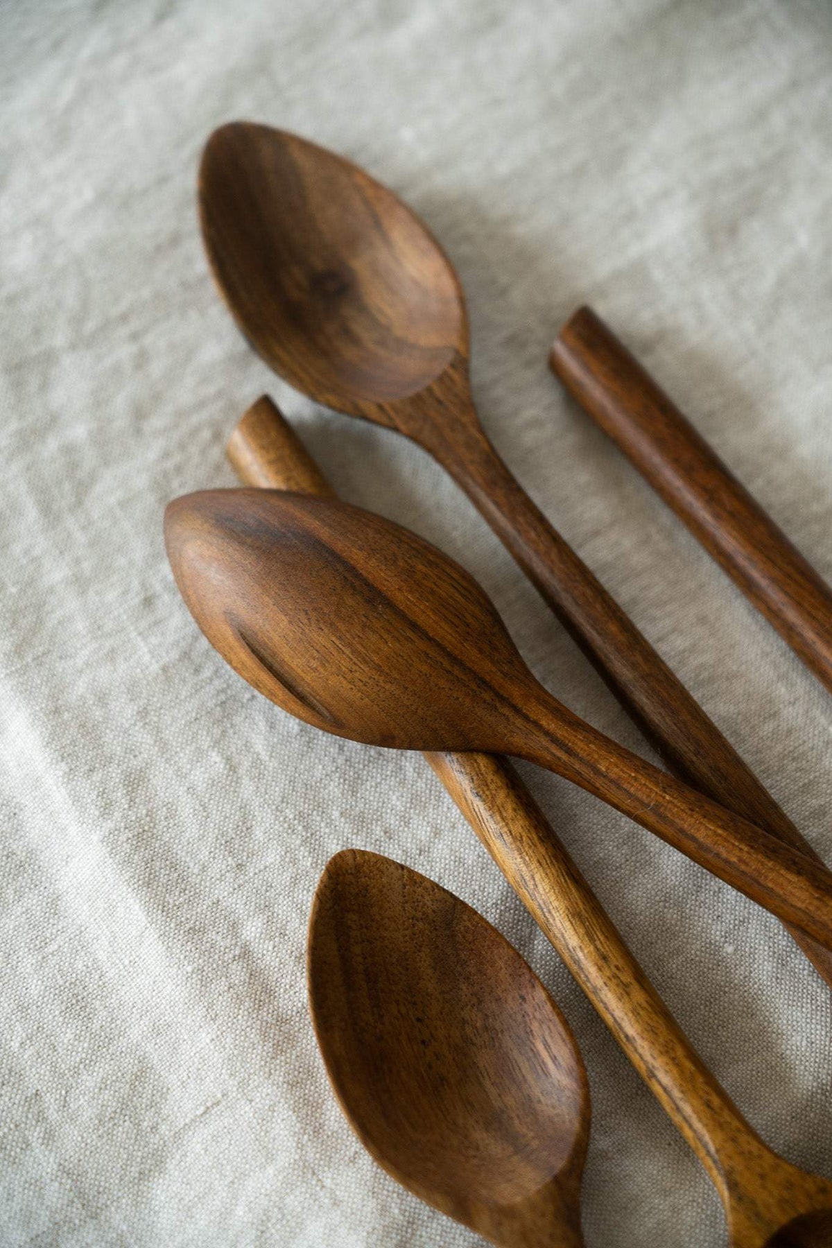 Soup Walnut Wood Spoon with a deep oval bowl, smooth hand-carved warm brown wood, and distinctive natural grain.