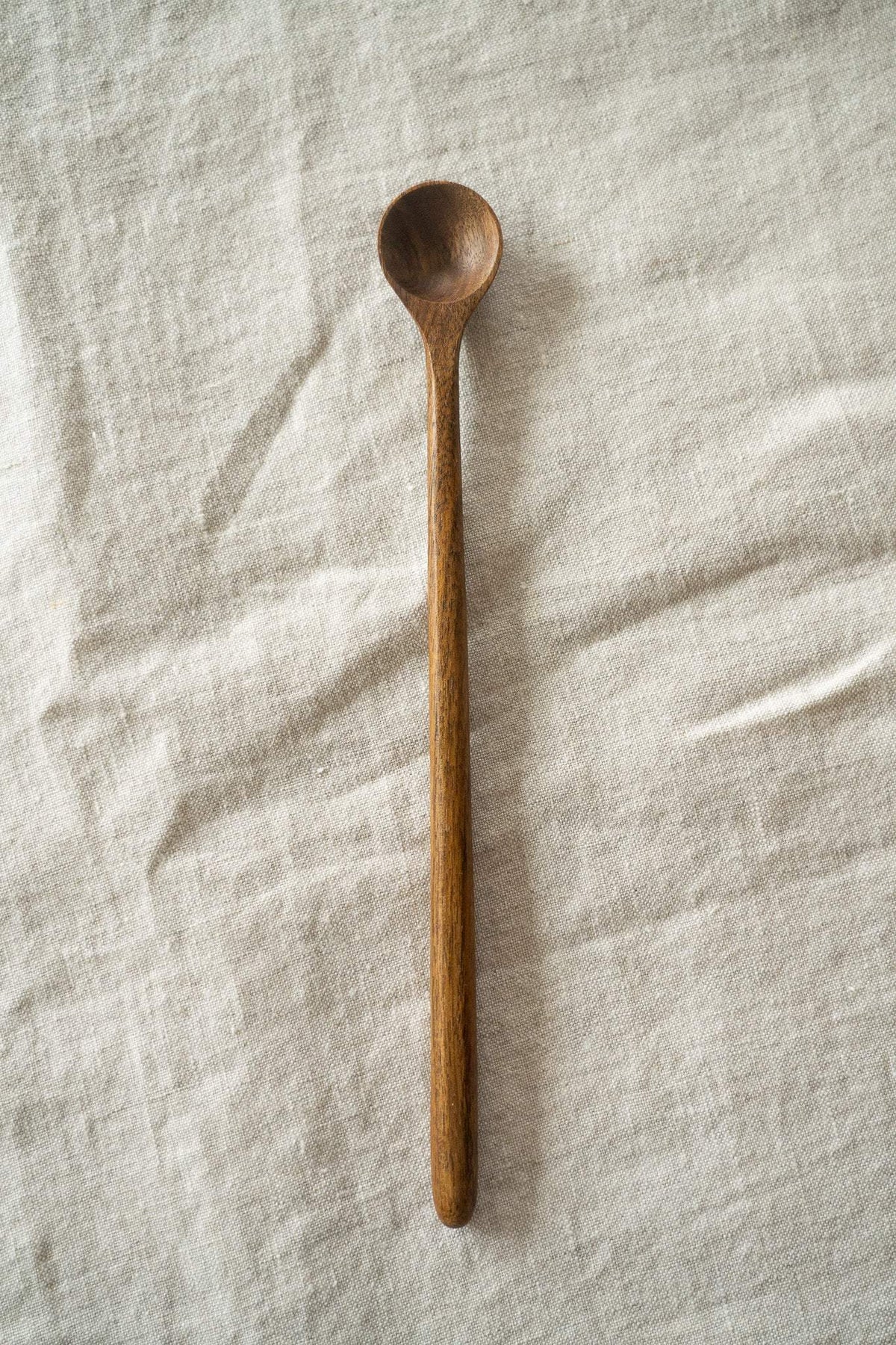 Hand carved walnut wood long coffee spoon with smooth finish and tall handle