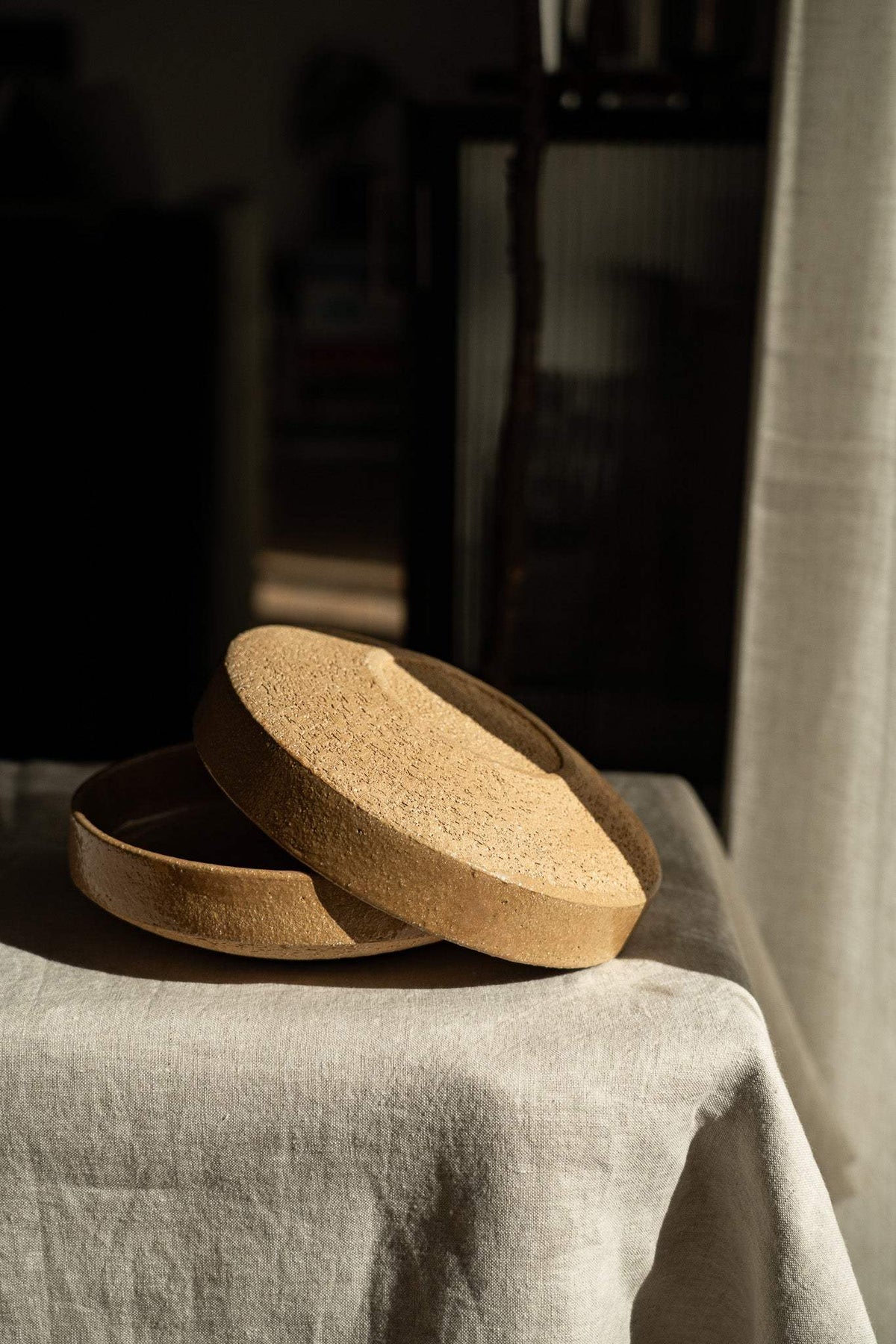 Handmade yellow stoneware breakfast bowl with natural speckles and glazed interior