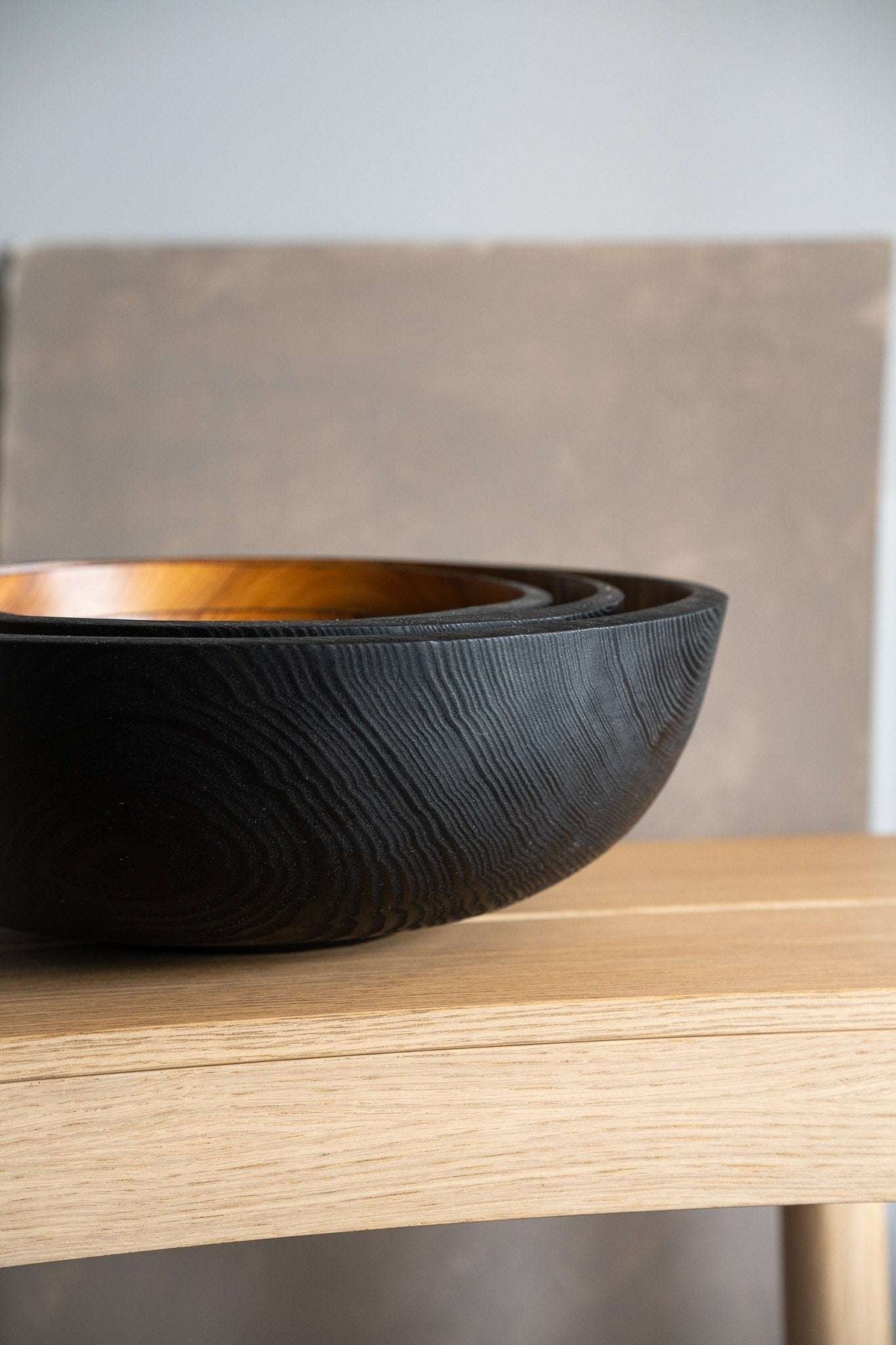 Hand carved extra large wooden bowl with half charred black interior made from solid ash wood