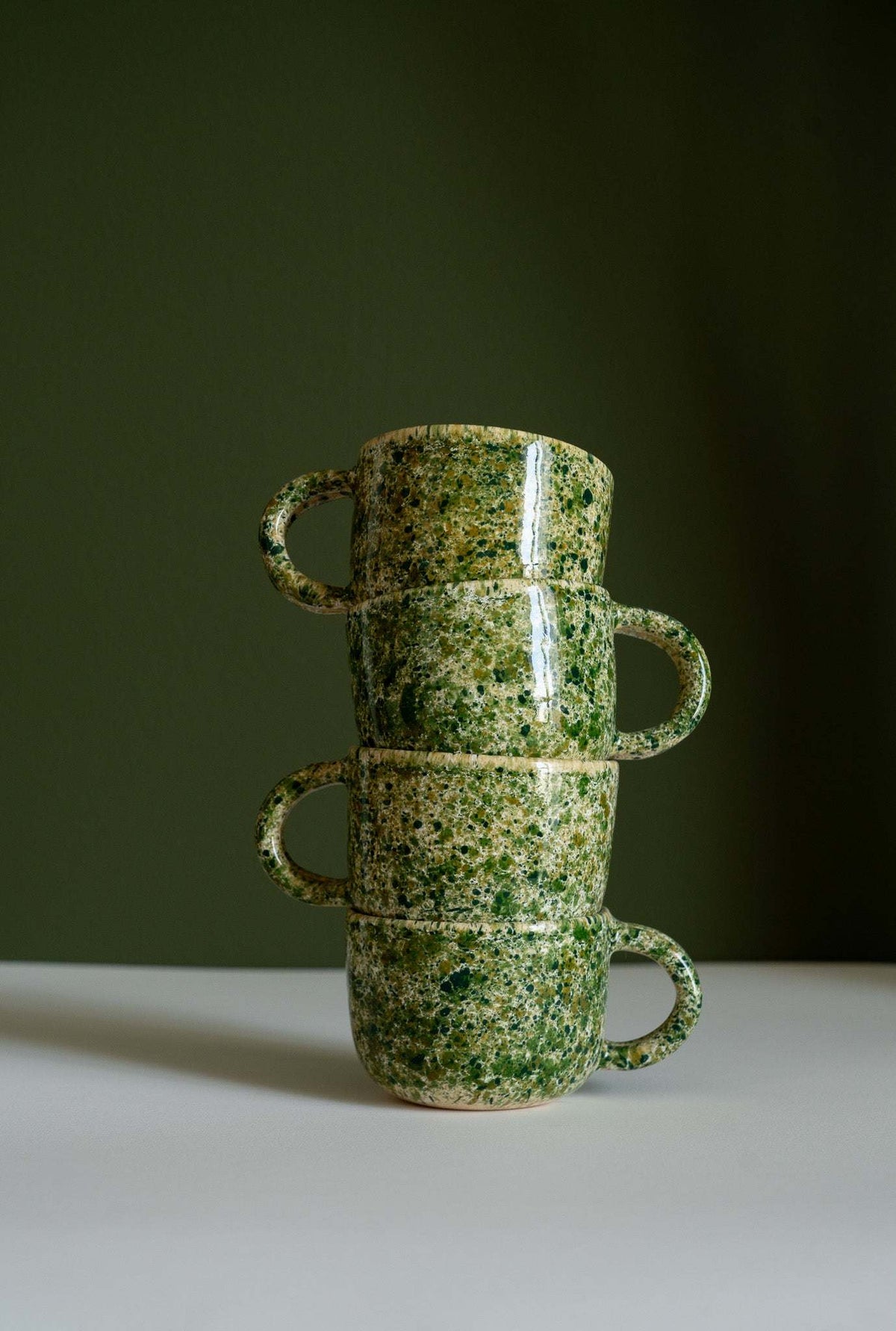 Hand painted personalized stoneware mug with double handle and organic splatter glaze design