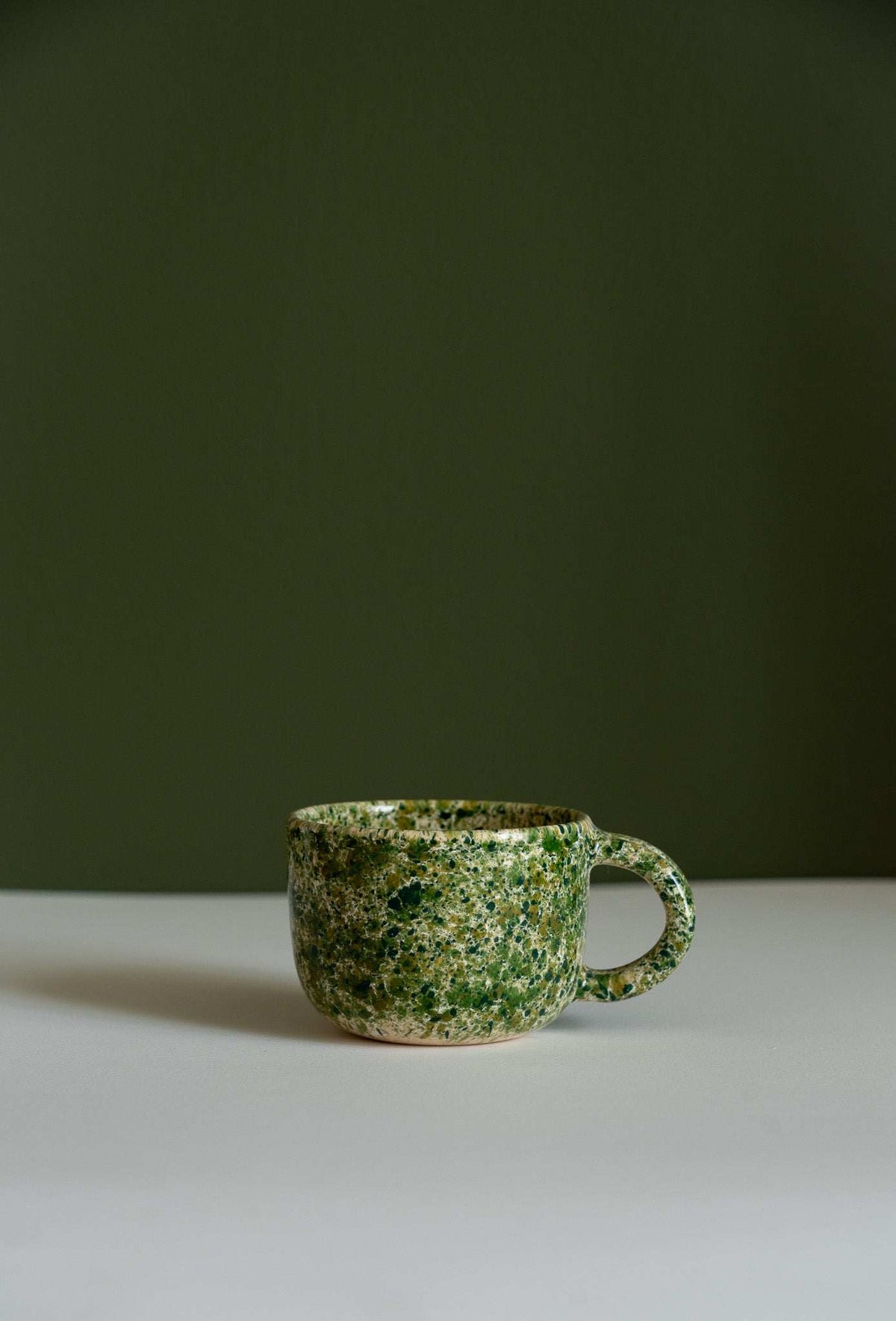 Hand painted personalized stoneware mug with double handle and speckled glaze
