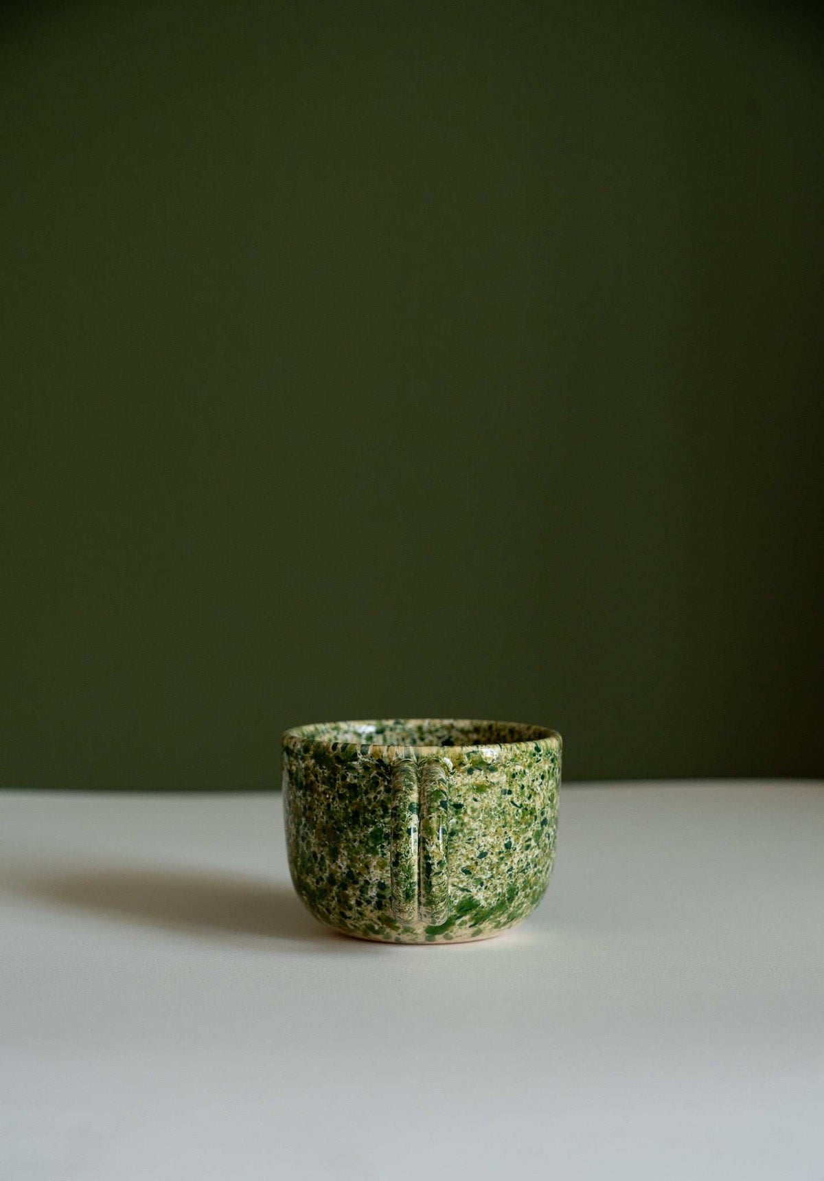Hand painted personalized stoneware mug with splatter glaze and double handle
