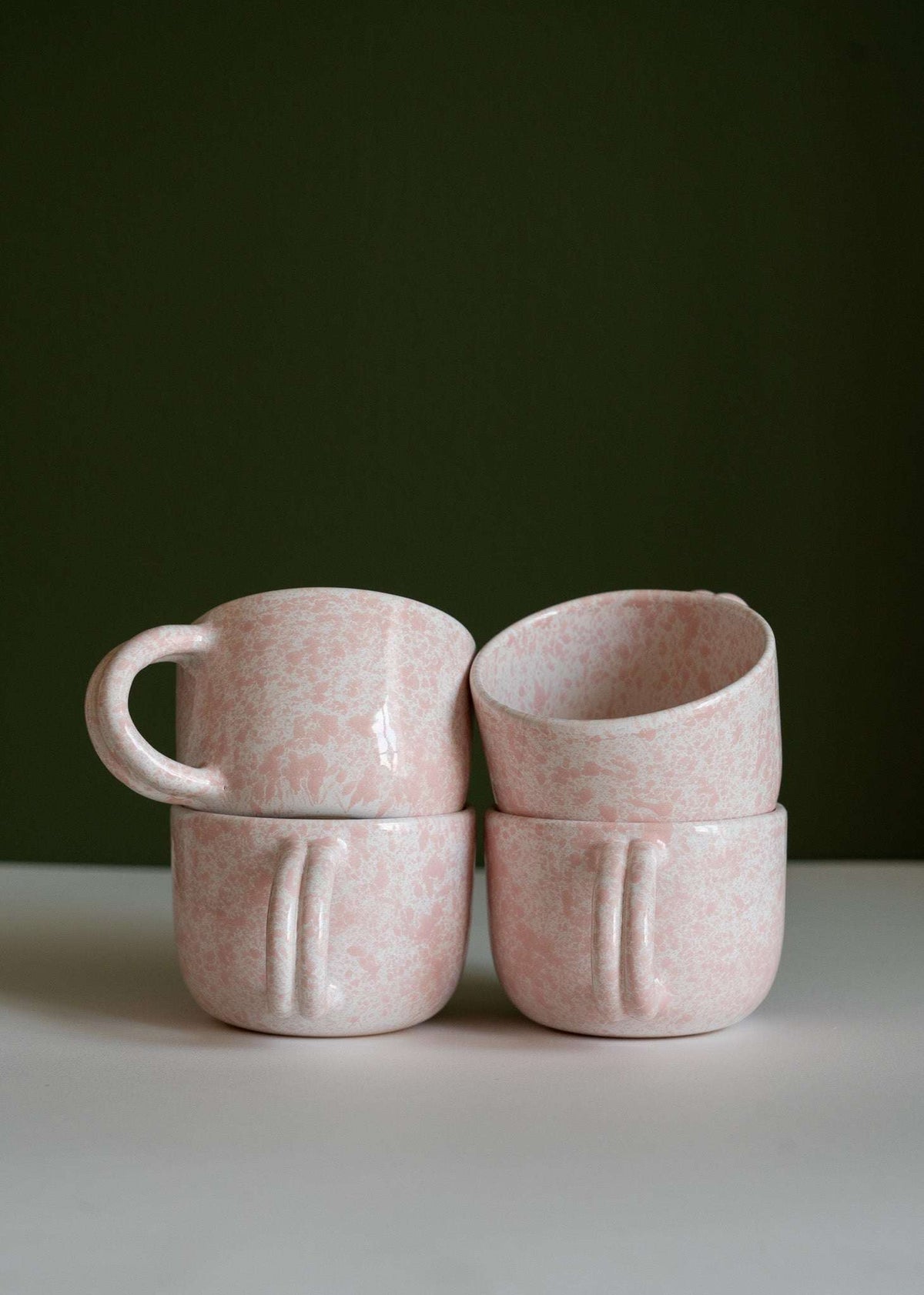 Hand painted personalized stoneware mug with double handle and splatter glaze design