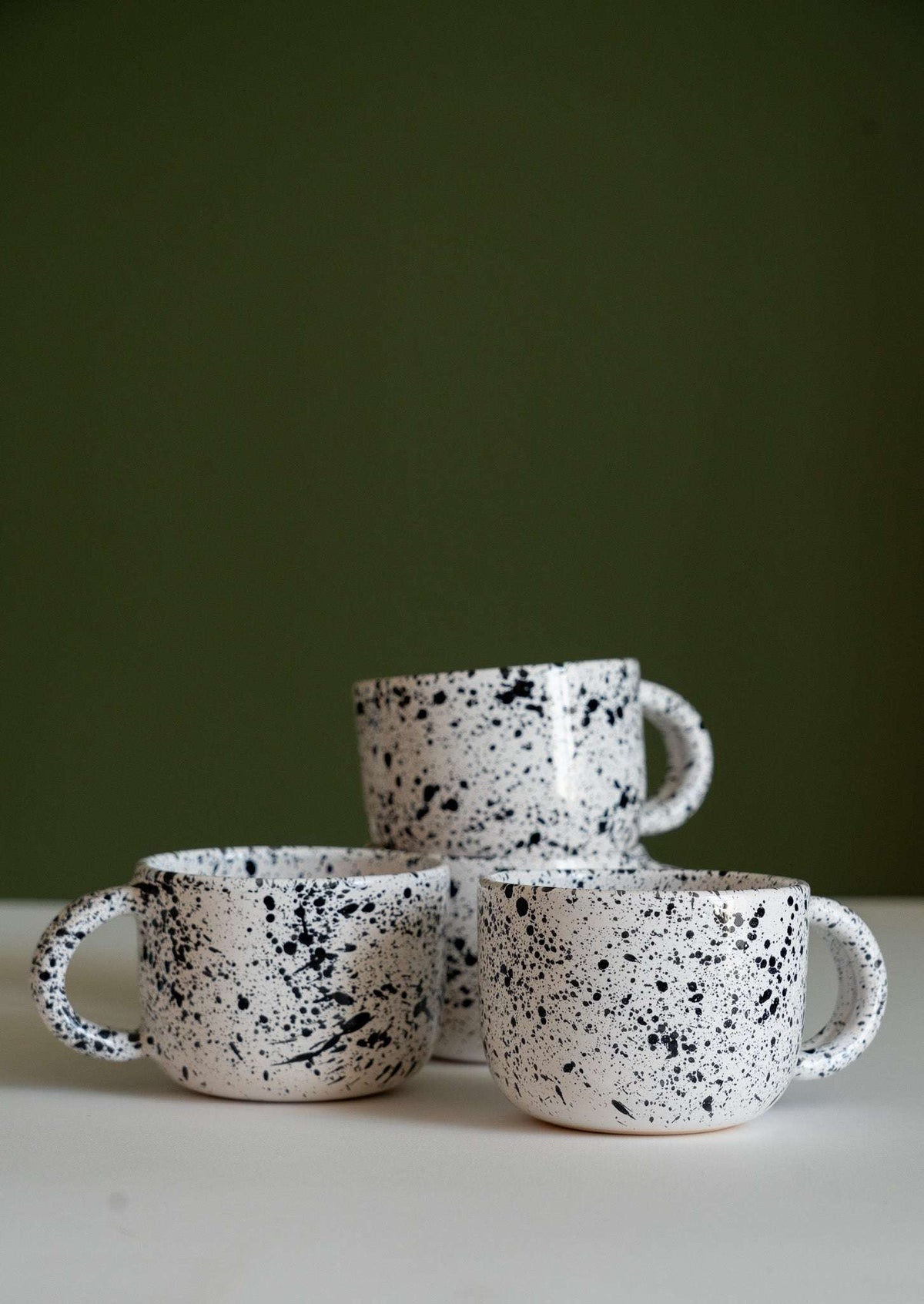 Hand painted speckled personalized stoneware mug with double handle in glossy finish