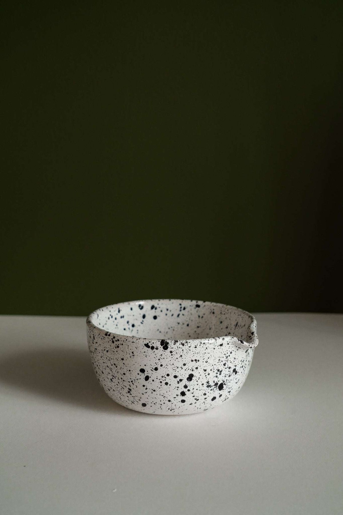 Deep stoneware mixing and serving nesting bowl set with pour spout and artisanal black speckles