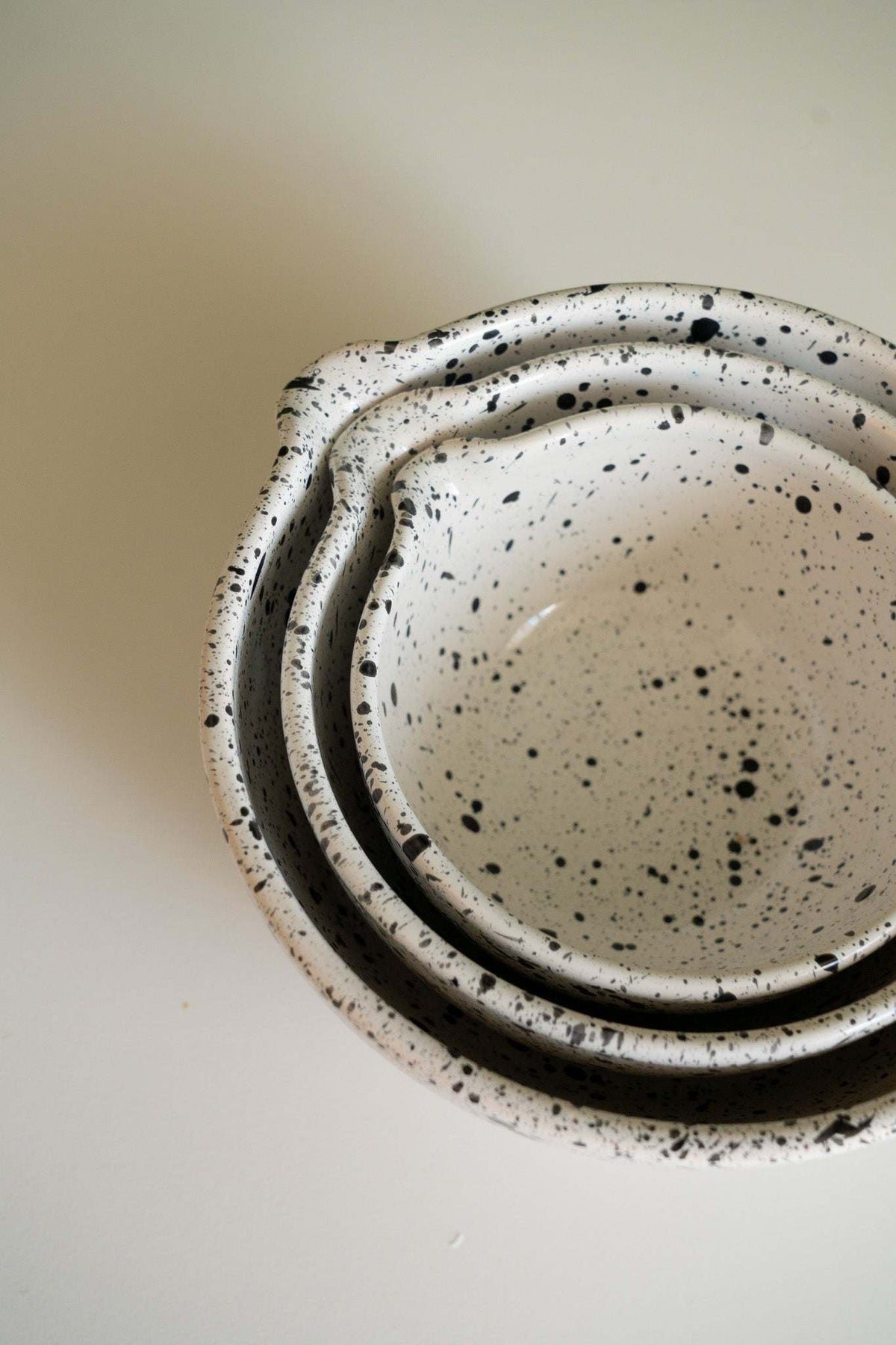 Deep stoneware mixing and serving bowls with pour spouts and artisanal speckled finish nesting set