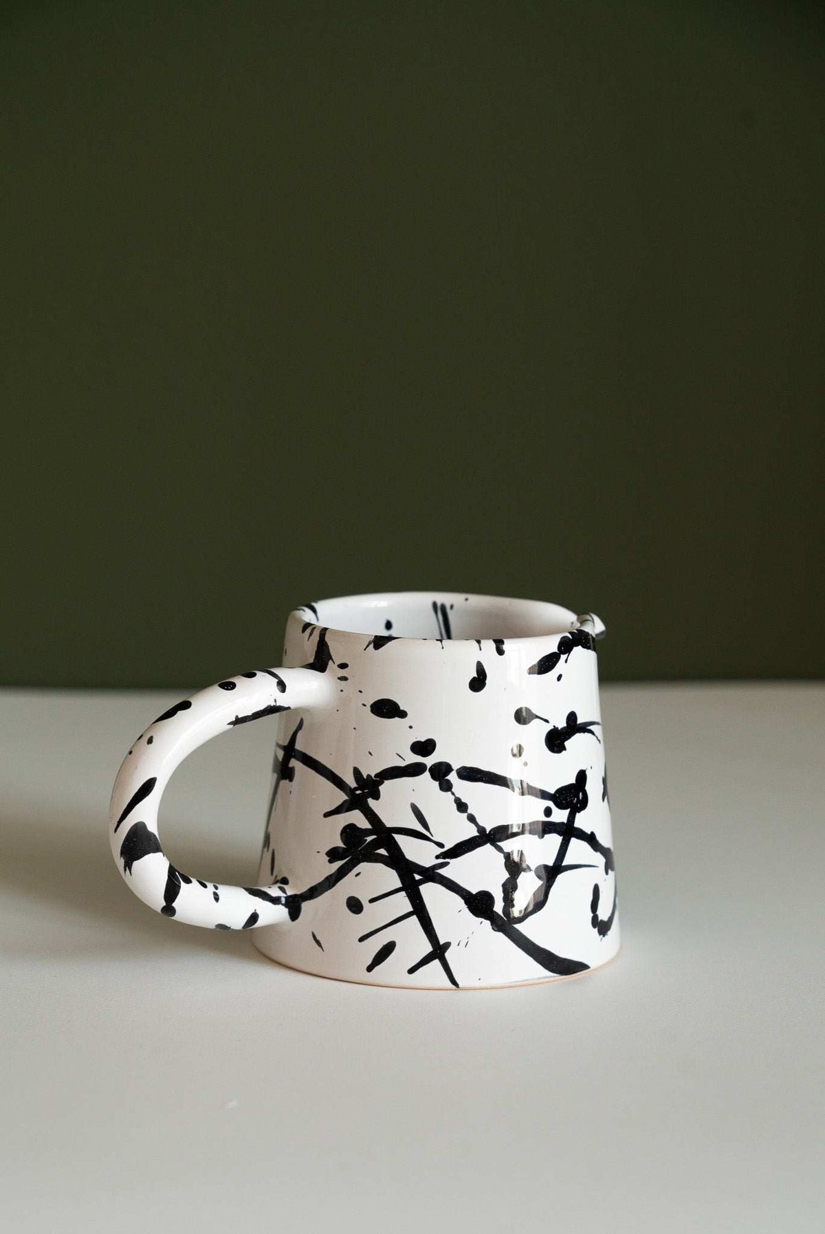 Handmade ceramic pour over coffee set with stoneware dripper and pitcher in monochrome finish