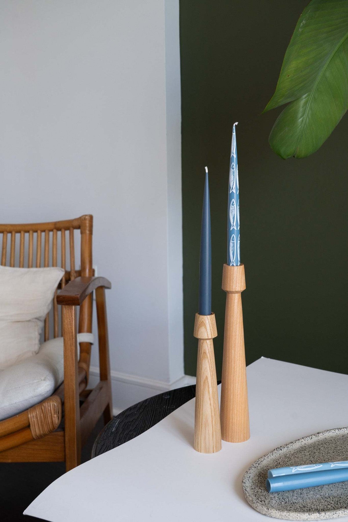 Hand-painted taper candle set with blue sardine illustrations for coastal decor