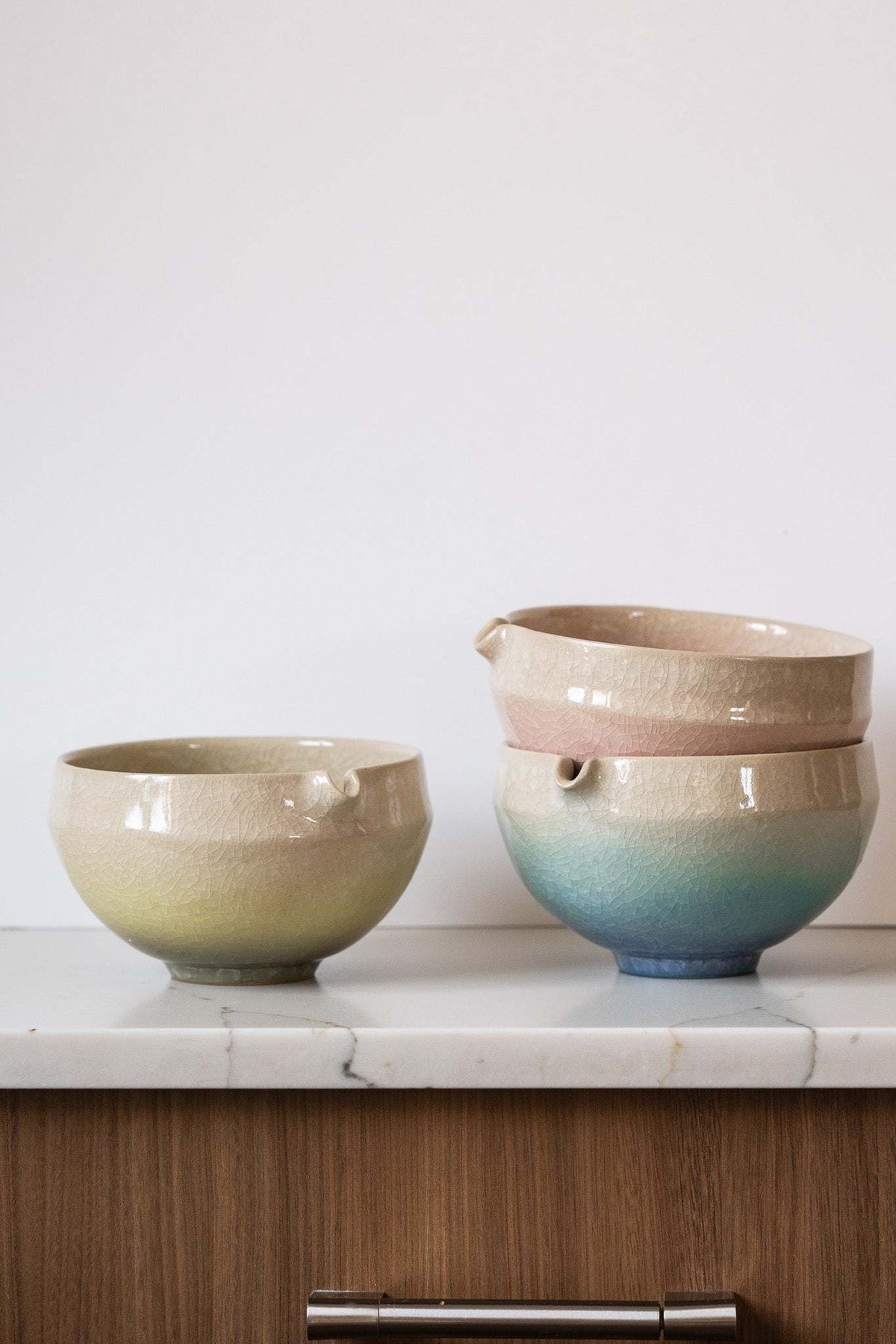 Ceramic Matcha Bowl and cup set in speckled stoneware with cream, pale green and blue gradient glaze and spouts.