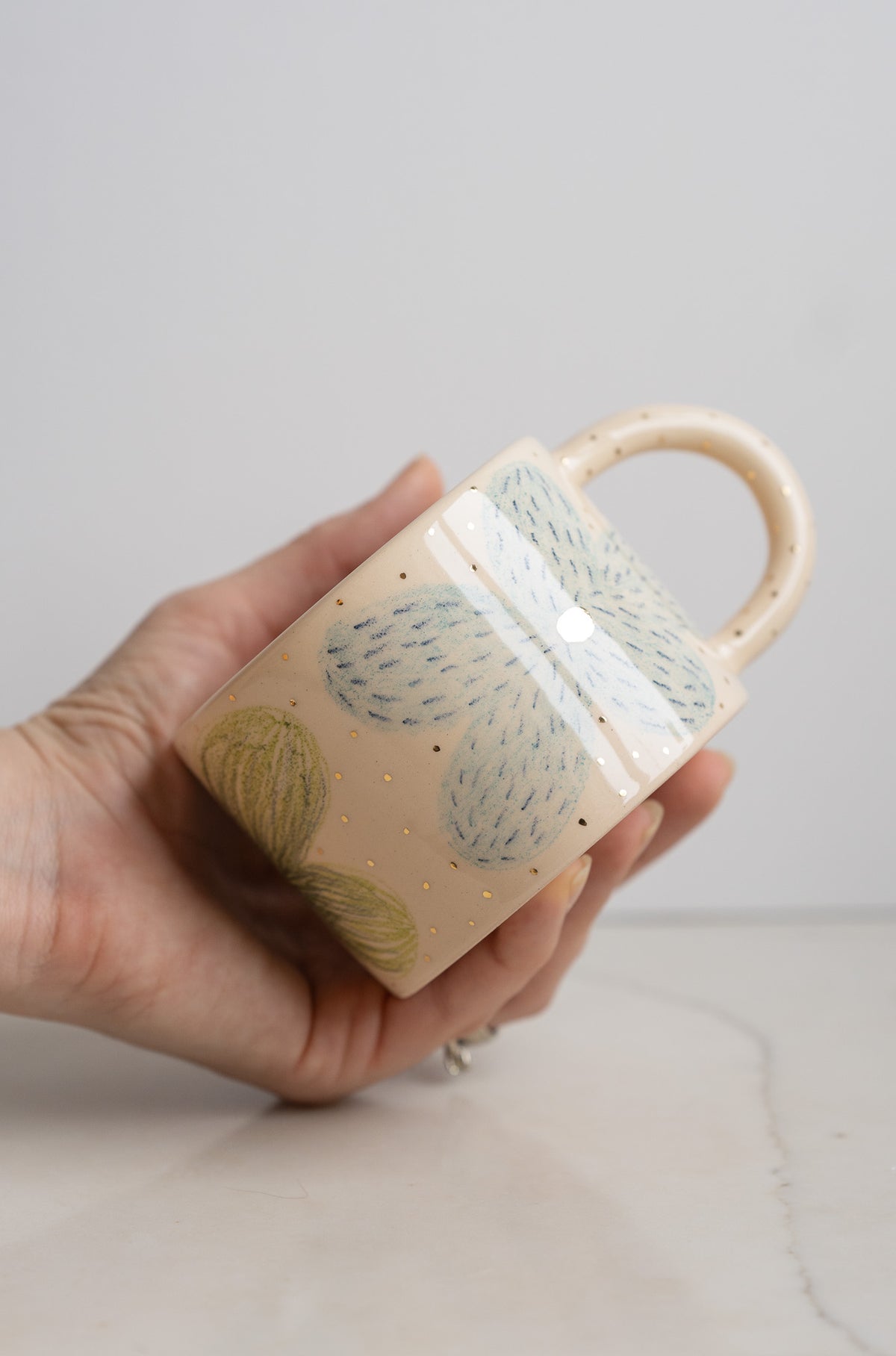 Hand-Painted Floral Stoneware Mug with Gold Accents