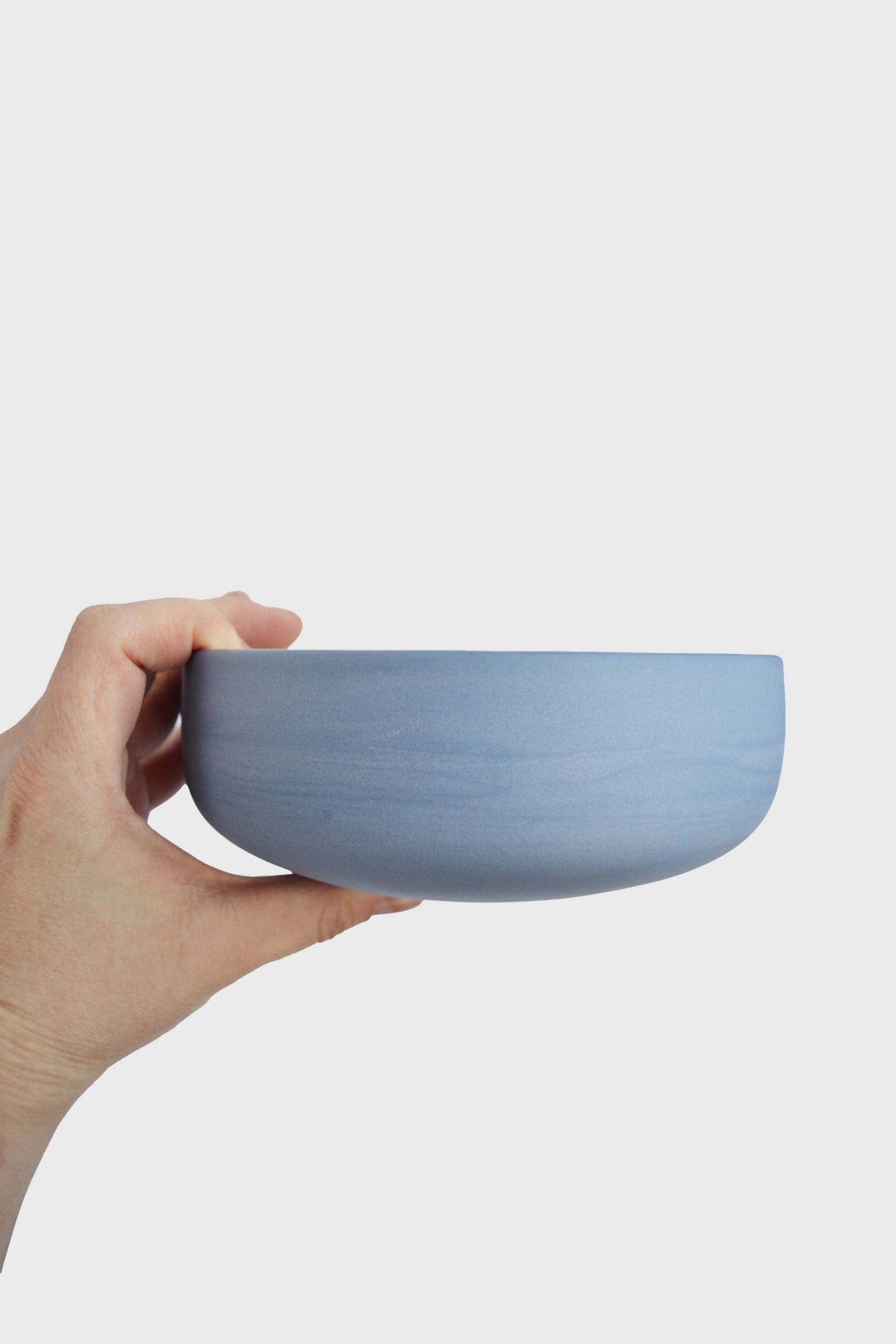 Handmade porcelain bowl with forget-me-not exterior and chocolate glazed interior, food-safe and dishwasher safe