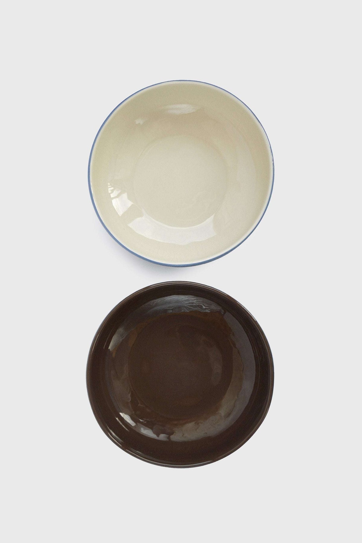 Handmade porcelain bowl with forget-me-not exterior and chocolate interior glaze