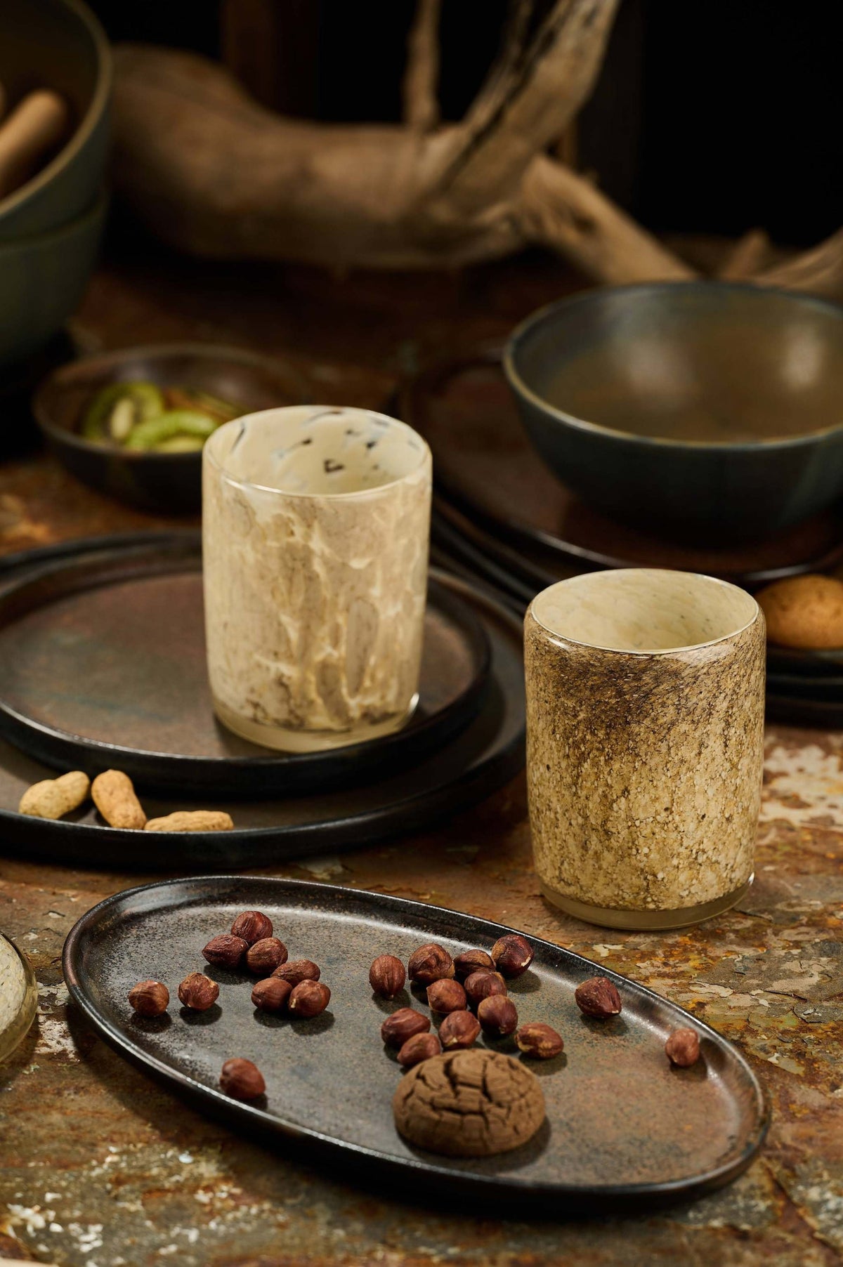 Hand blown glass tumbler with marble-inspired pattern and straight edges, unique and handcrafted in Ukraine
