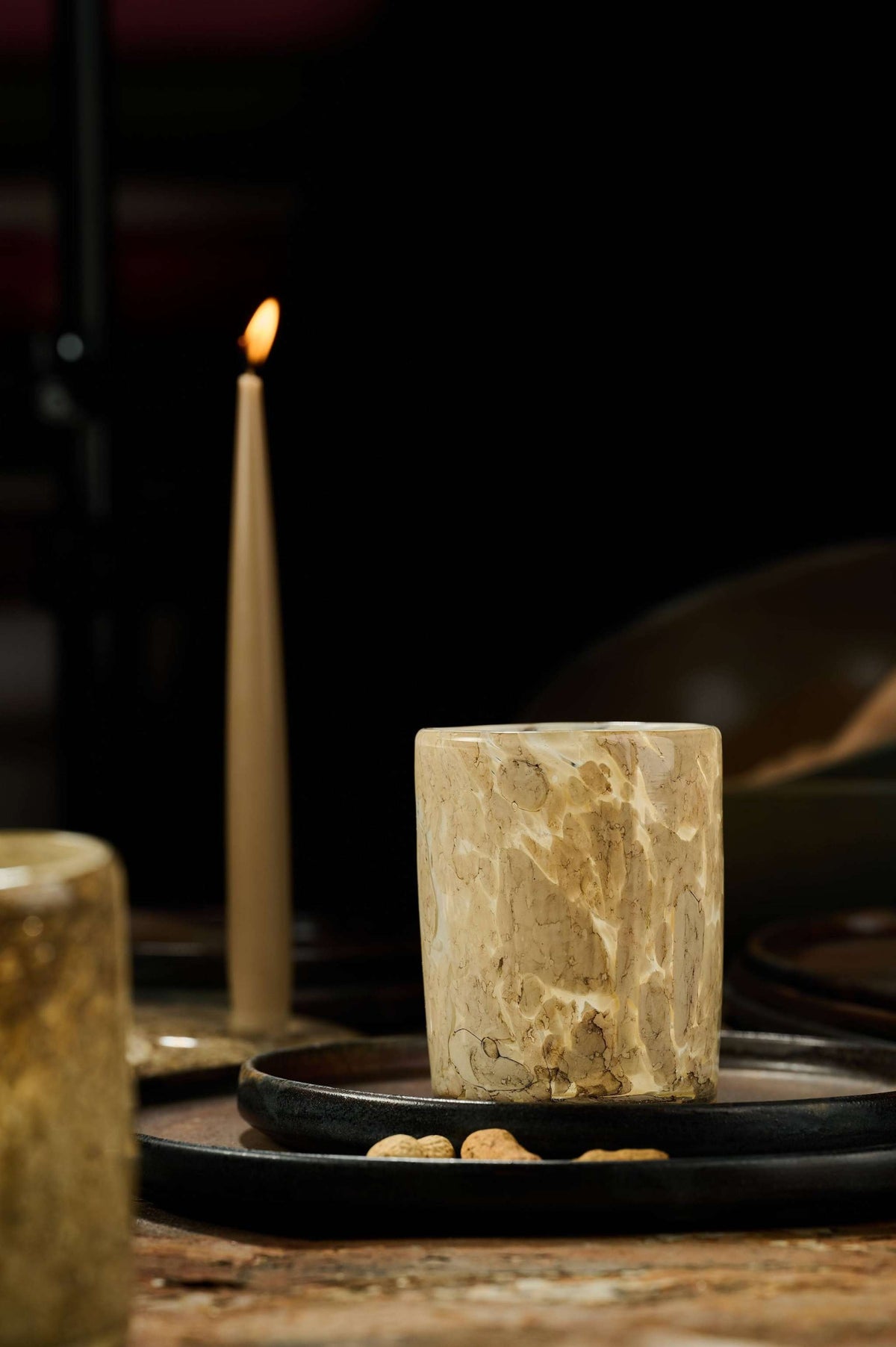 Hand blown glass tumbler with marble pattern and straight edges, unique and handcrafted in Ukraine