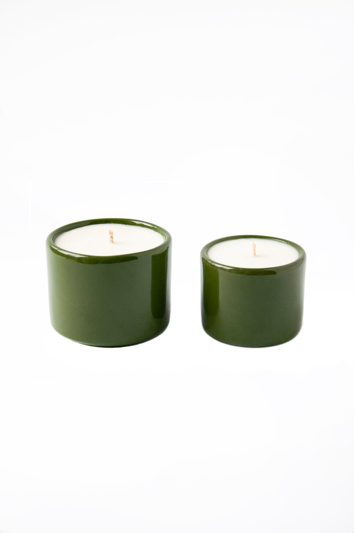 Handmade green porcelain candle with organic soy wax in a refillable bowl