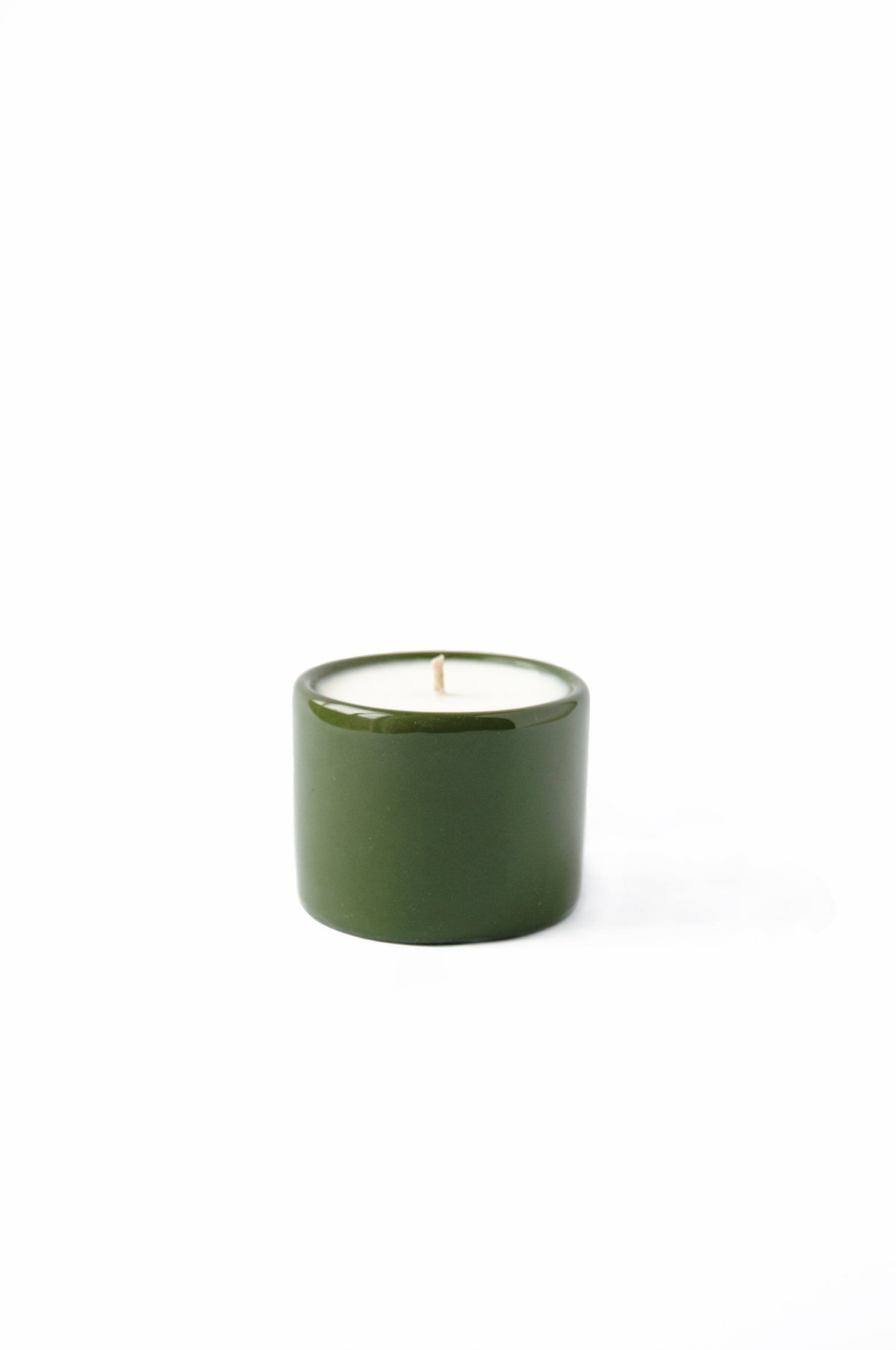 Handmade green porcelain candle with organic soy wax in refillable bowl, made in Ukraine