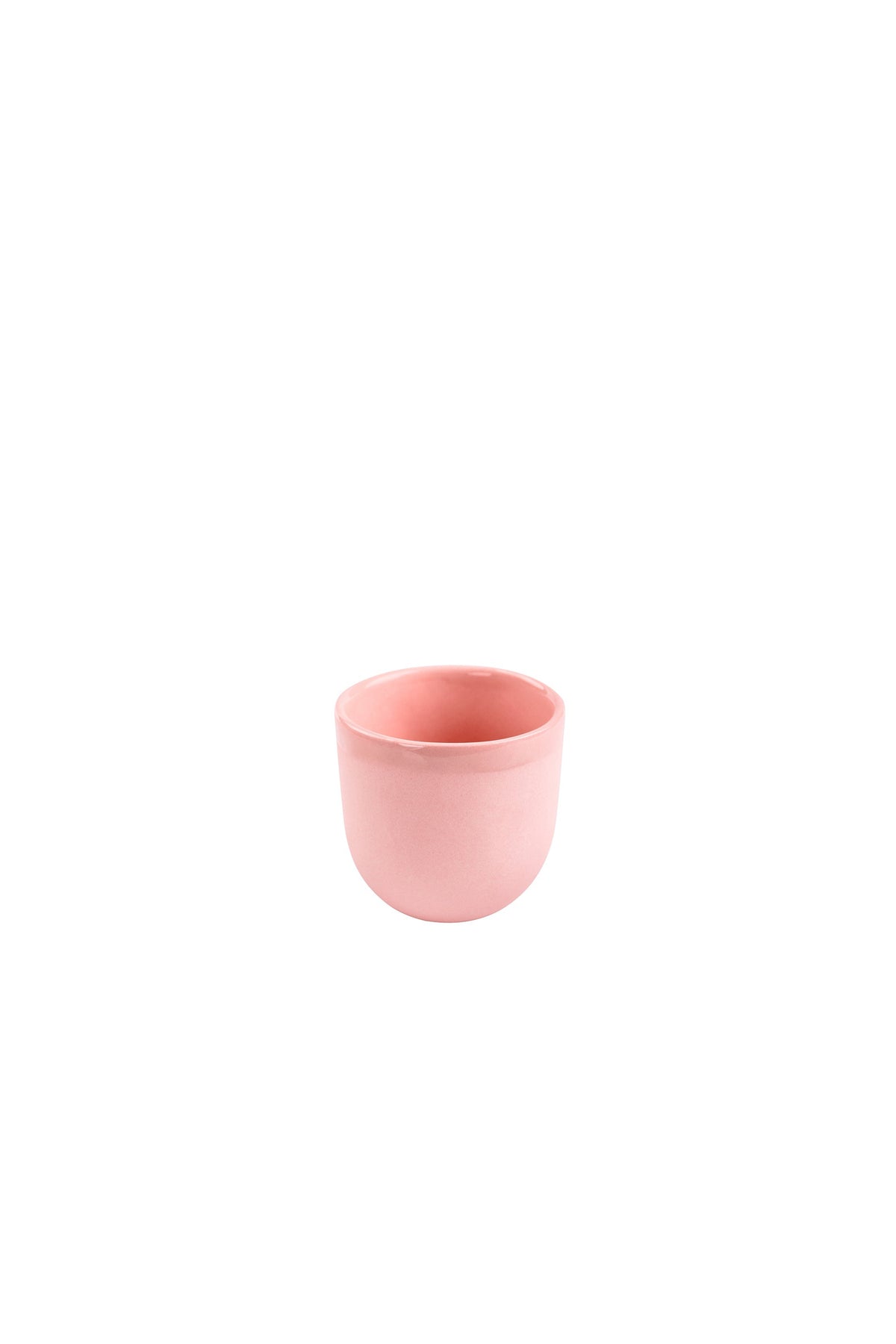 Handmade porcelain espresso cup in powder pink with exposed clay and shiny glaze, dishwasher safe