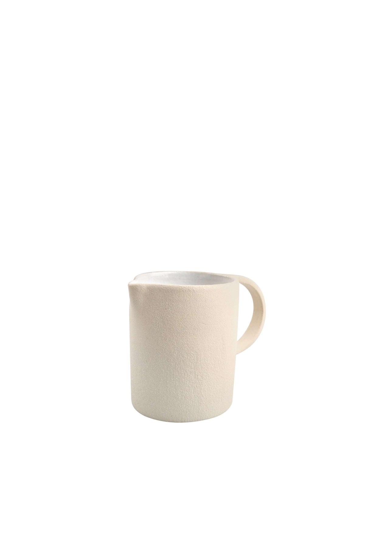 Handmade stoneware pitcher with rough texture and white glazed interior, crafted in Ukraine
