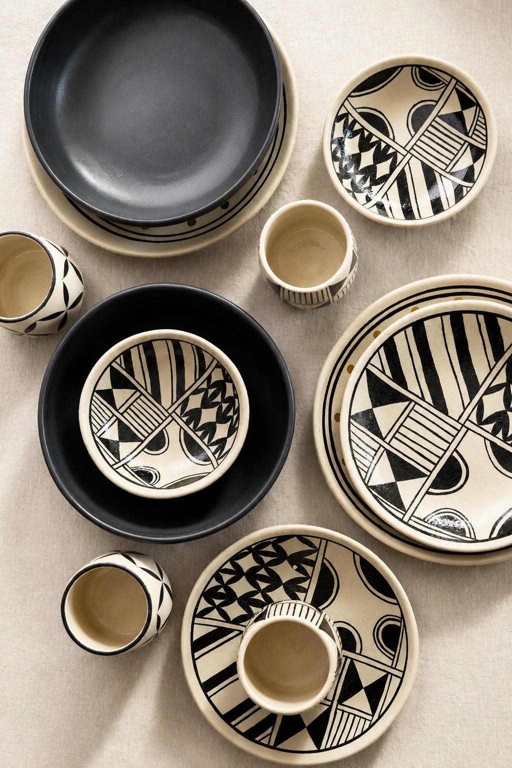 Hand Painted Stoneware Salad Plate, cream ceramic with bold black geometric motifs and an irregular handcrafted rim.