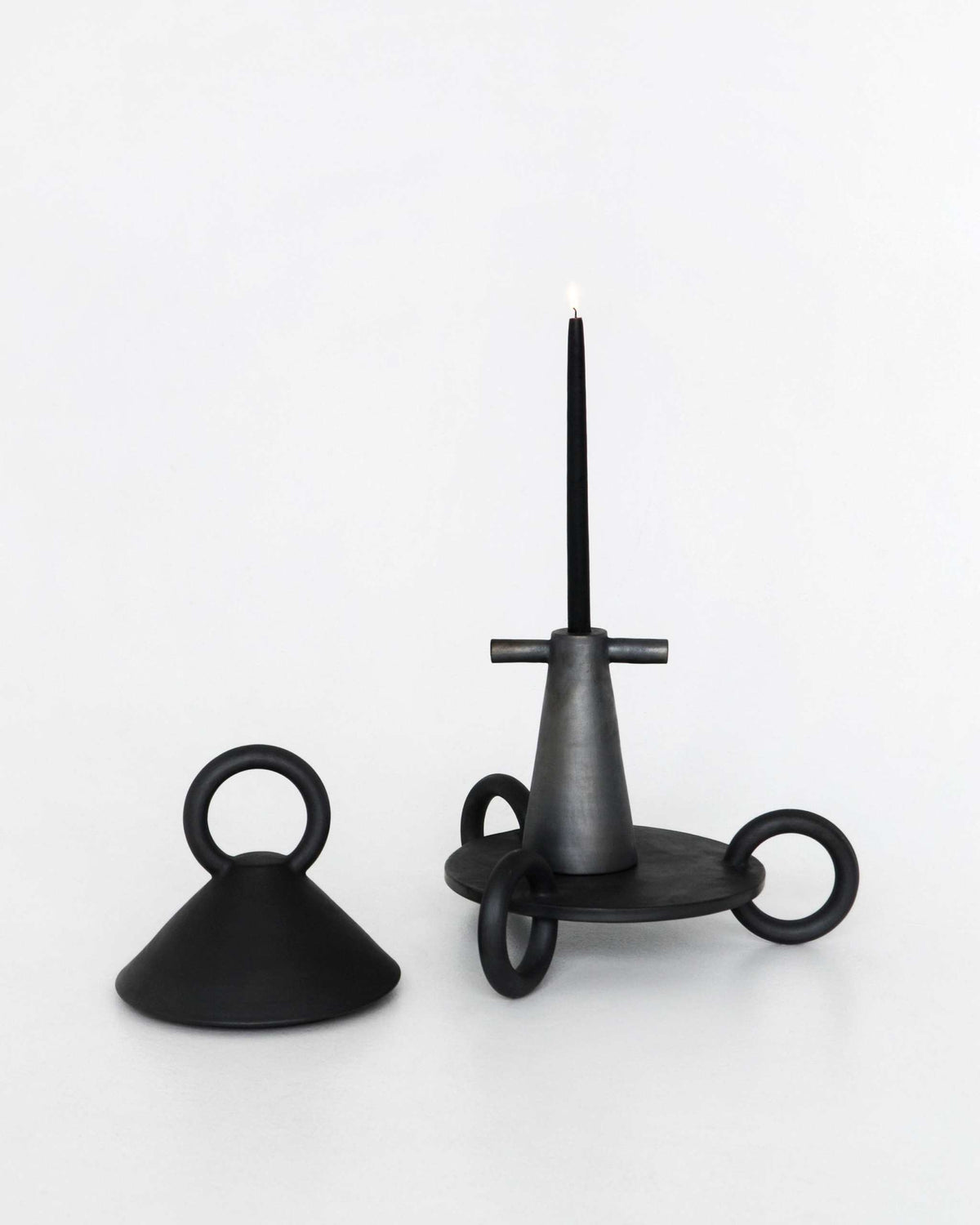 Black stoneware tall candle holder handmade in Ukraine with smoked ceramic finish