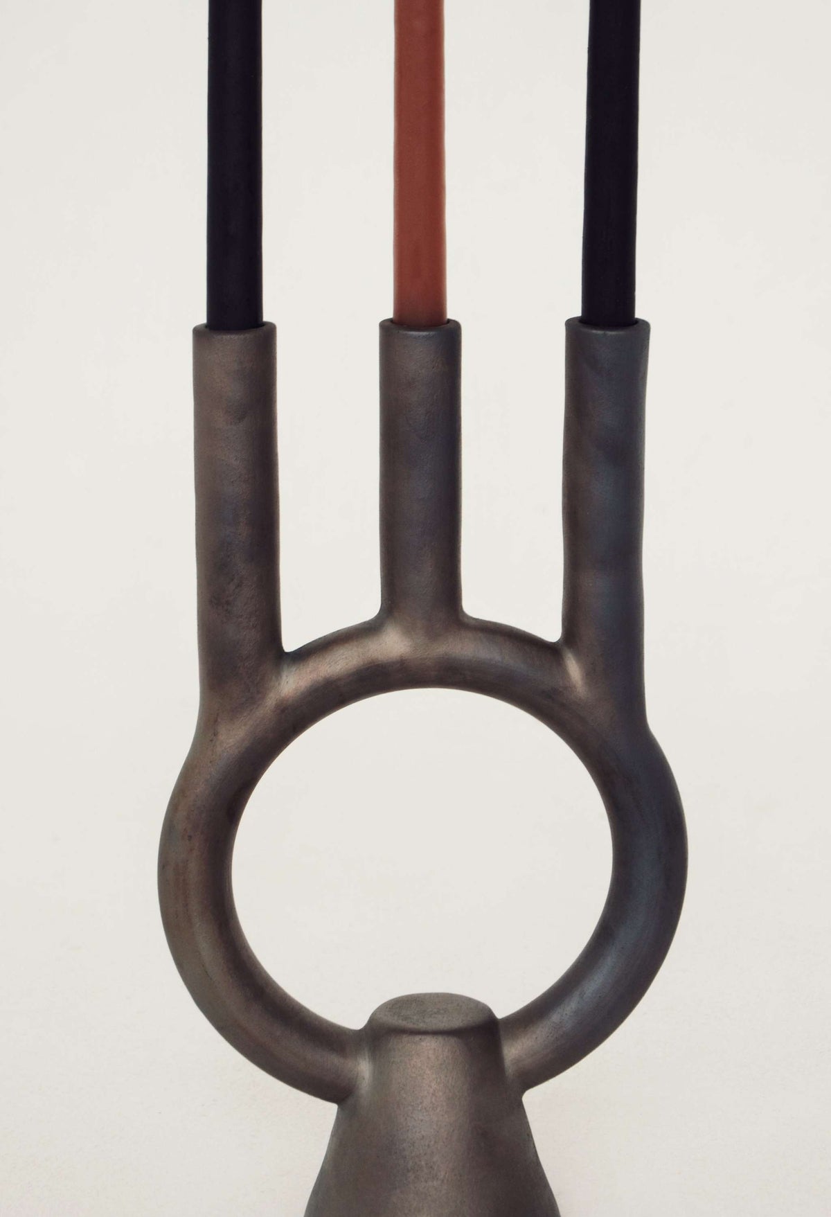 Smoke-fired ceramic black candle holder by Danuta Kril, handmade in Ukraine with deep cultural meaning