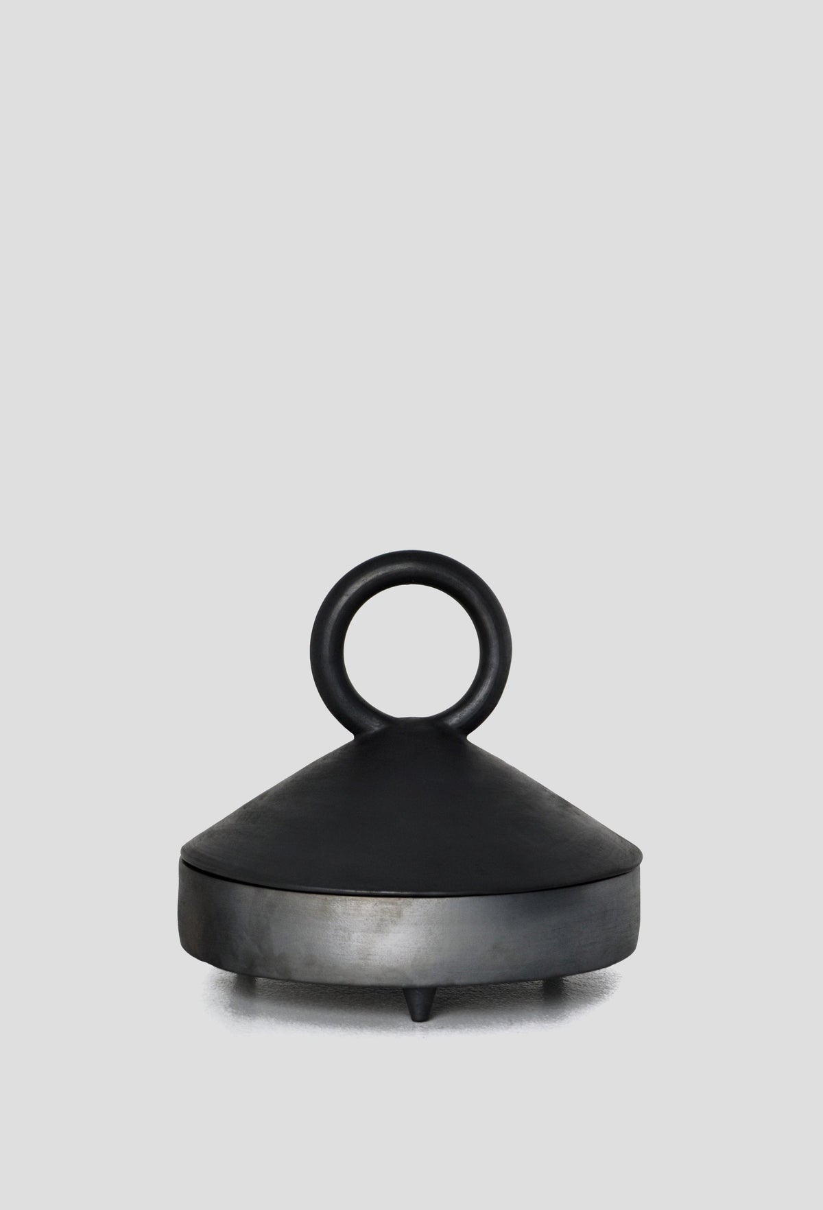 Handmade shallow serving bowl with lid made of black smoked ceramics by Danuta Kril, Ukrainian craft design