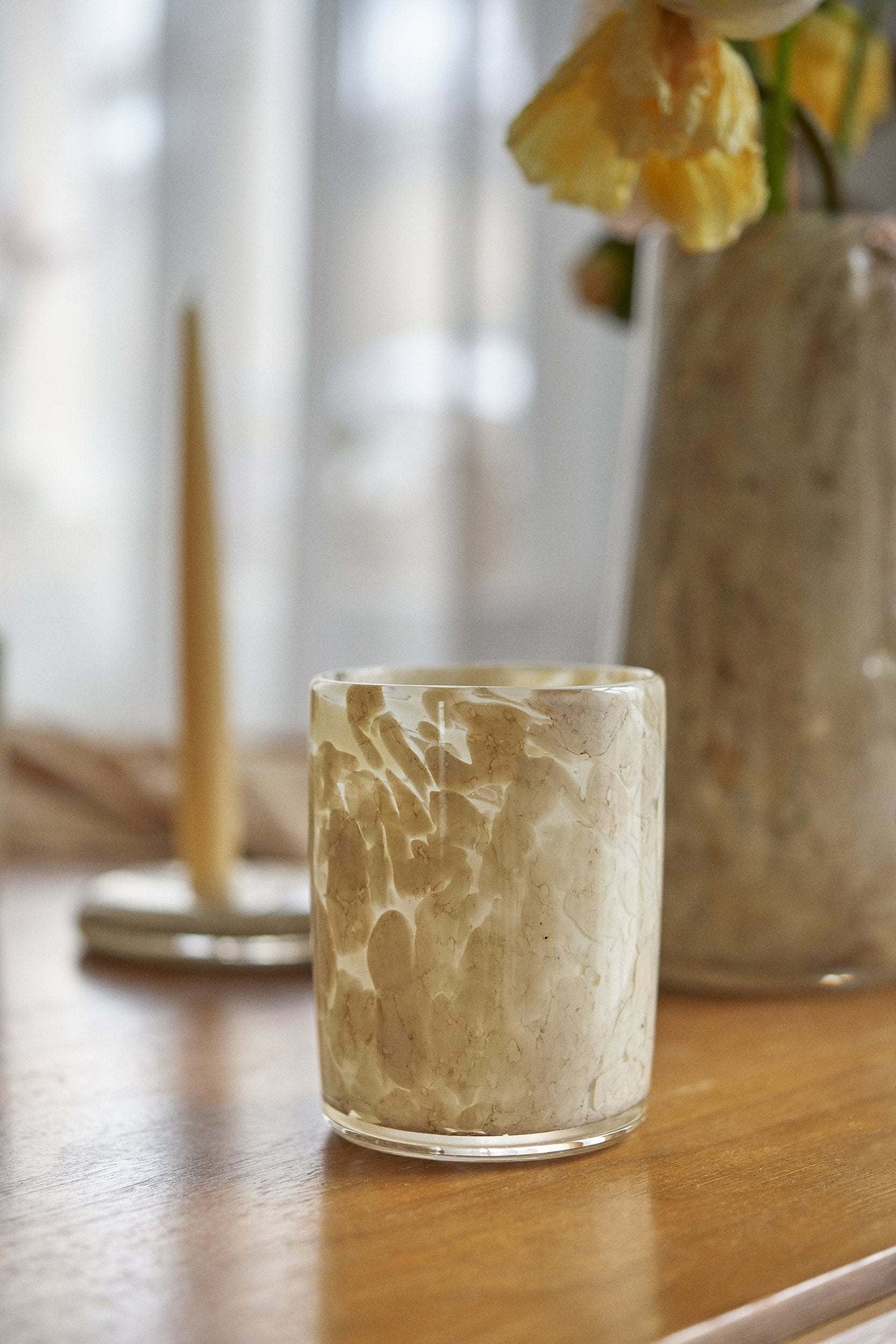 Hand blown glass tumbler with marble pattern and straight edges, unique and handmade in Ukraine