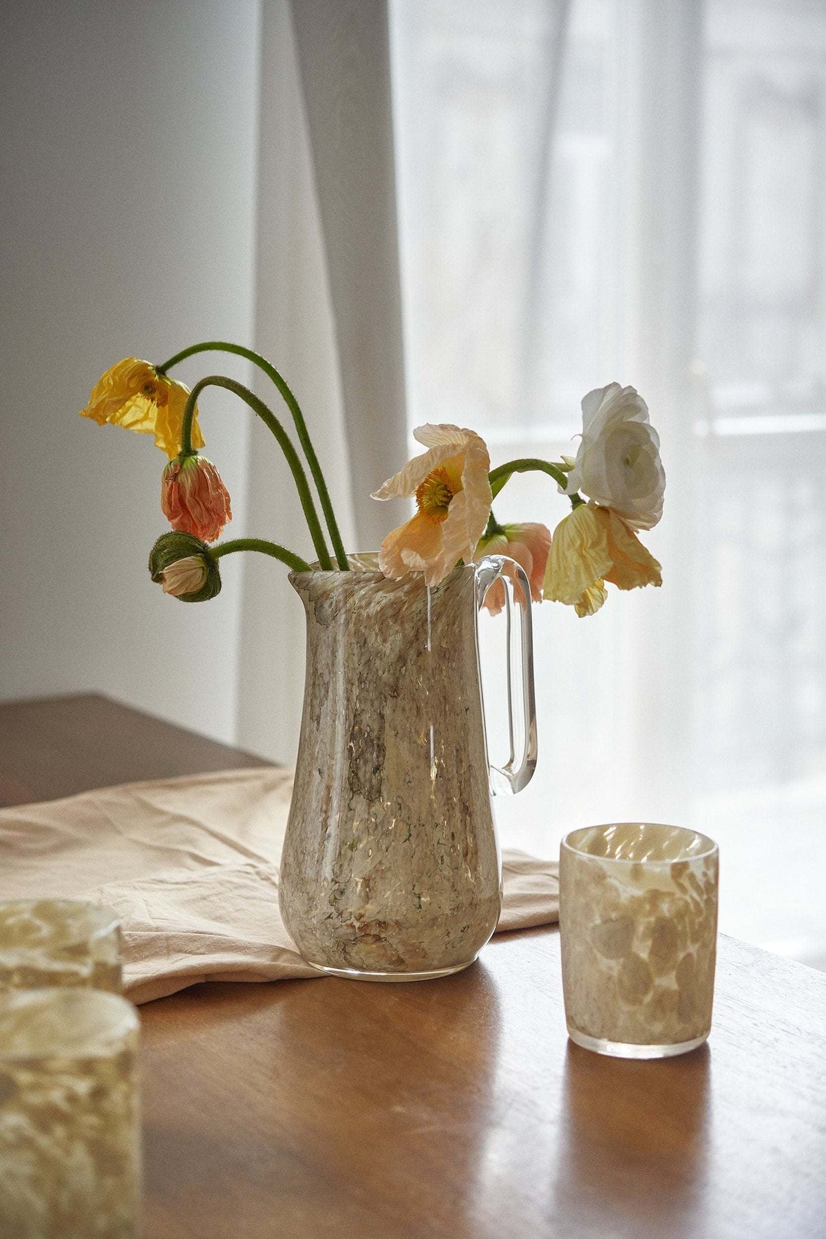 Hand blown glass tumbler with unique marble pattern and straight edges, handmade in Ukraine
