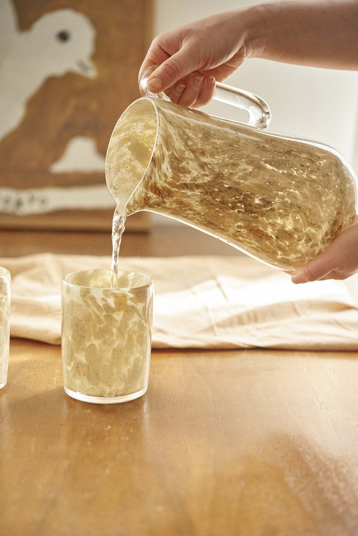 Hand blown glass tumbler with marble pattern and straight edges, unique and handmade in Ukraine