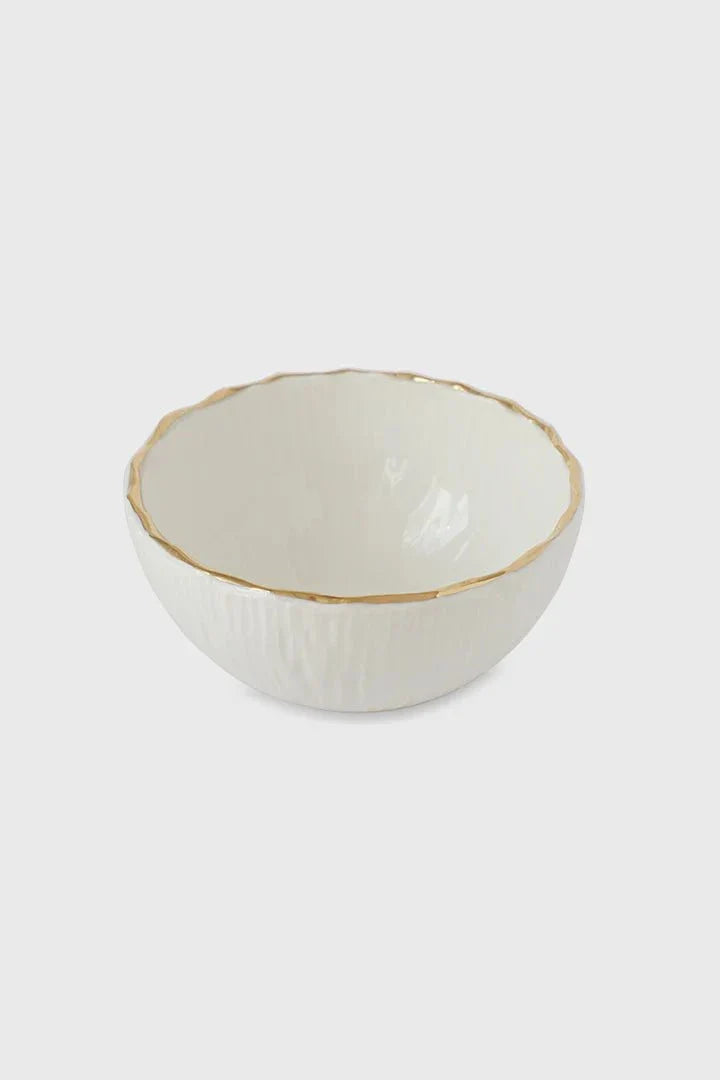 Handmade white porcelain bowl with gold rim and hand-carved relief texture from Relief Collection