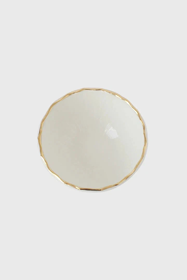 Handmade white porcelain bowl with gold rim and relief texture from Ukraine