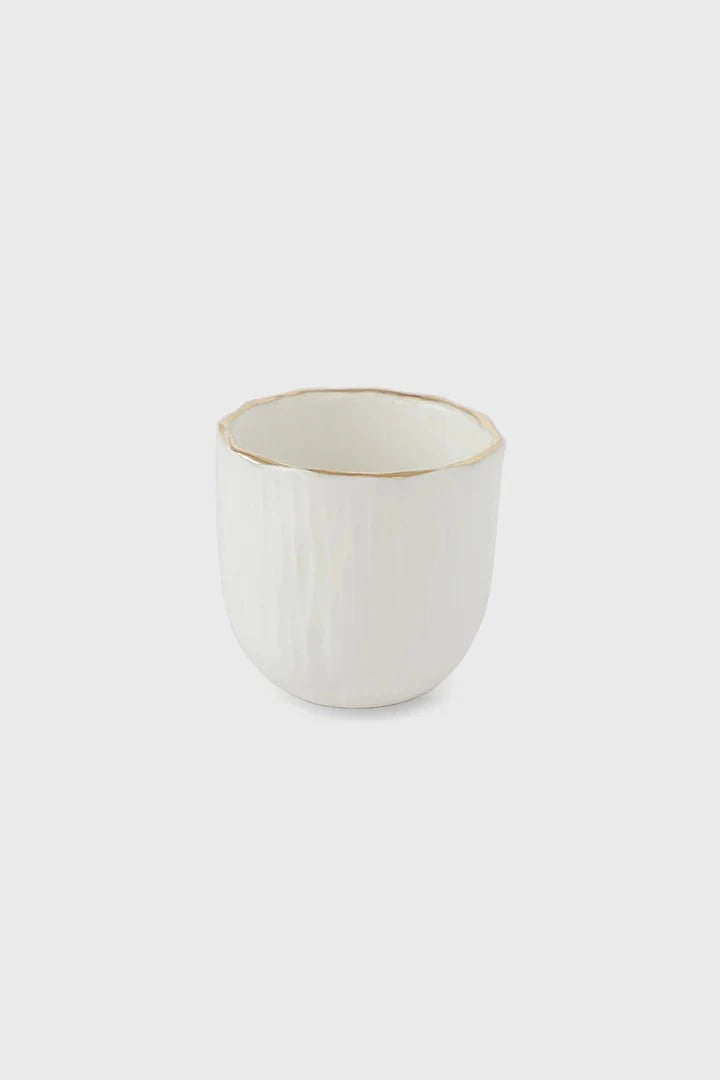 Handmade white porcelain espresso cup with gold rim from Relief Collection