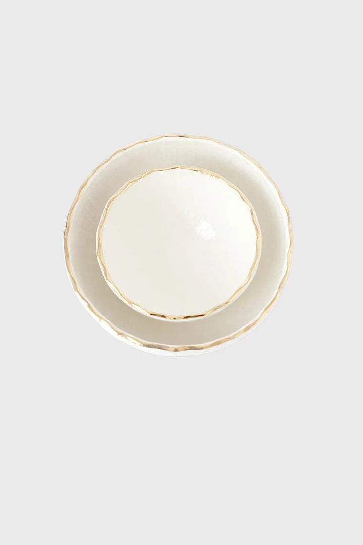 Handmade white porcelain bowl with gold rim and relief texture from Relief Collection