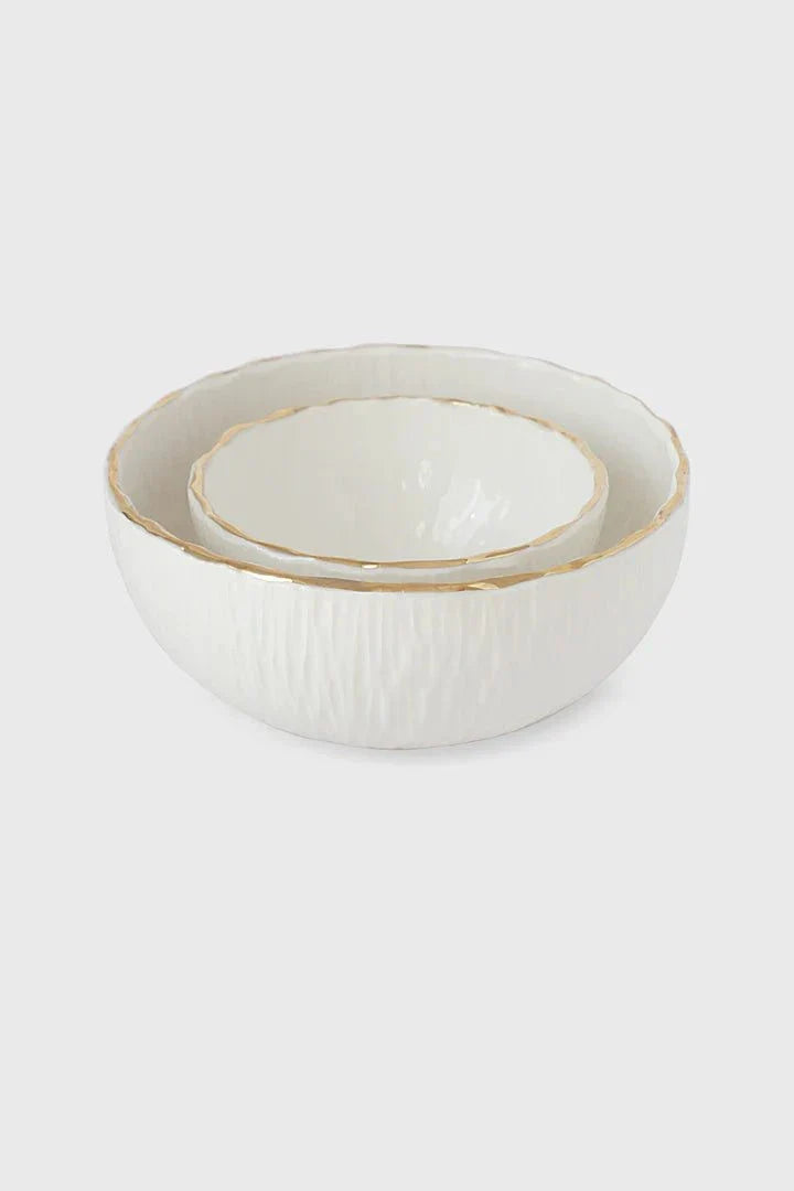 Handmade white porcelain bowl with gold rim and relief texture from Relief Collection
