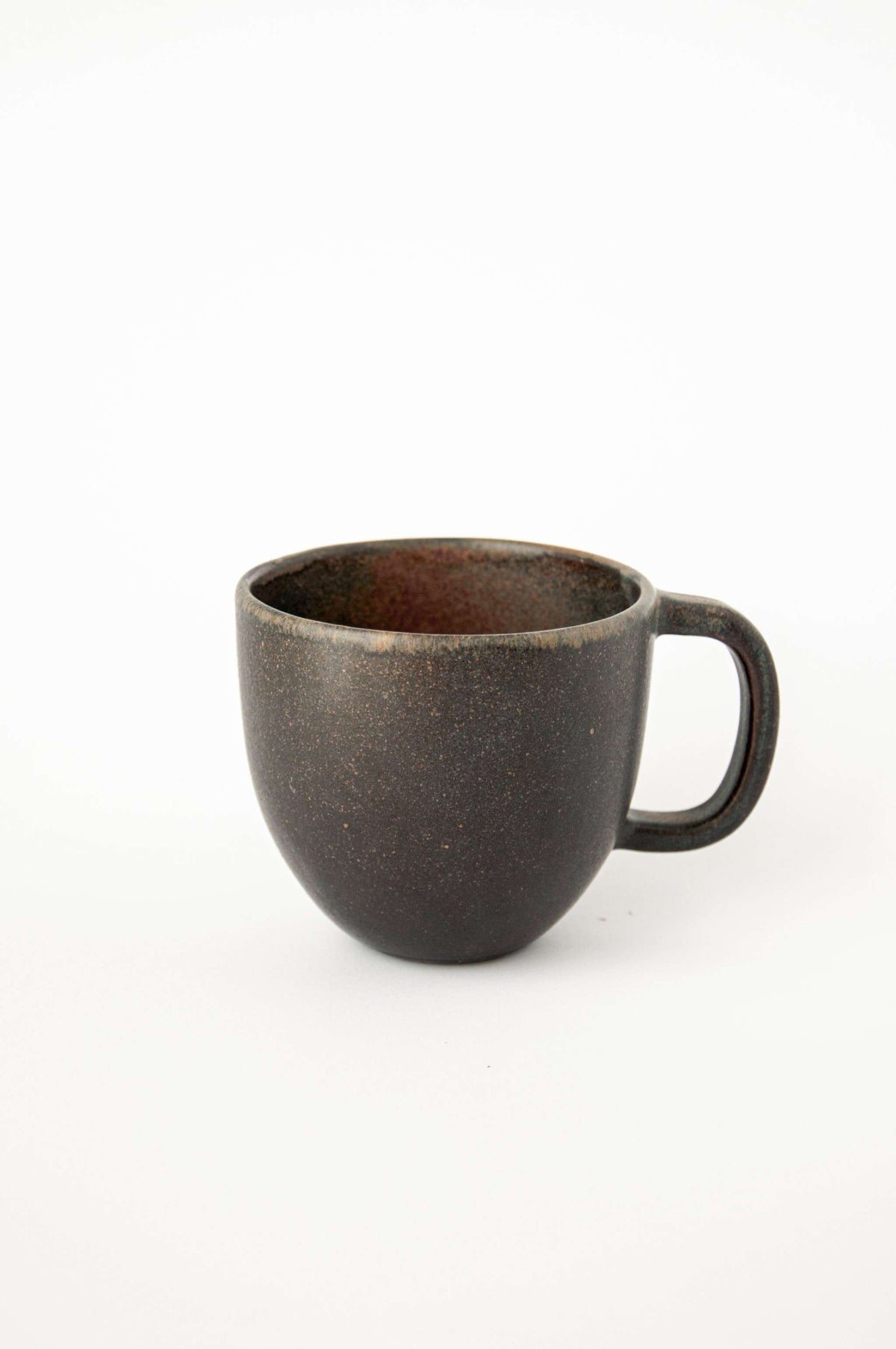 Rust stoneware mug with handle and reactive glaze, handmade in Ukraine, dishwasher and microwave safe