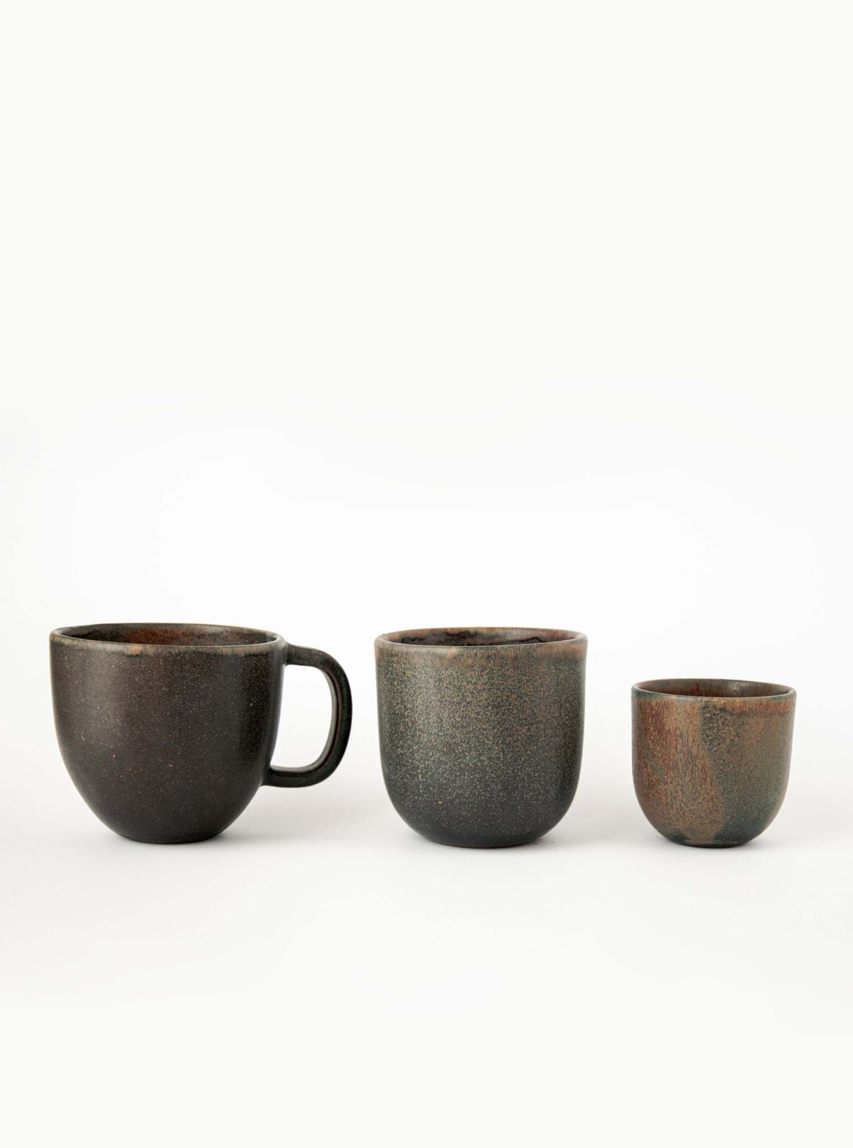 Rust handmade stoneware coffee cup with organic edges and reactive glaze swirl, 11oz, dishwasher-safe, handmade in Ukraine