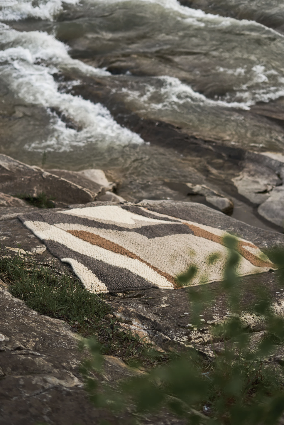 Hand woven area rug Stone in natural wool with warm tones and traditional smooth weaving technique