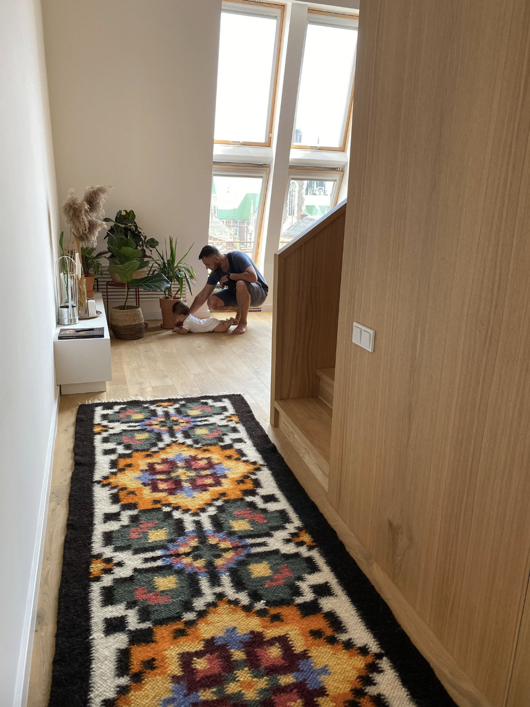 Handwoven wool runner with traditional Carpathian pattern made from 100% sheep wool, 3.4' x 6.5', showcasing intricate embroidery and warm natural fibers.