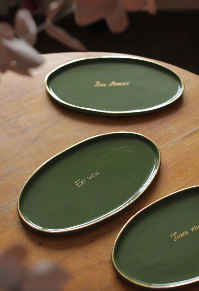 Personalized Wedding Platter, dark green ceramic oval trays with thin gold rims and gold lettering.