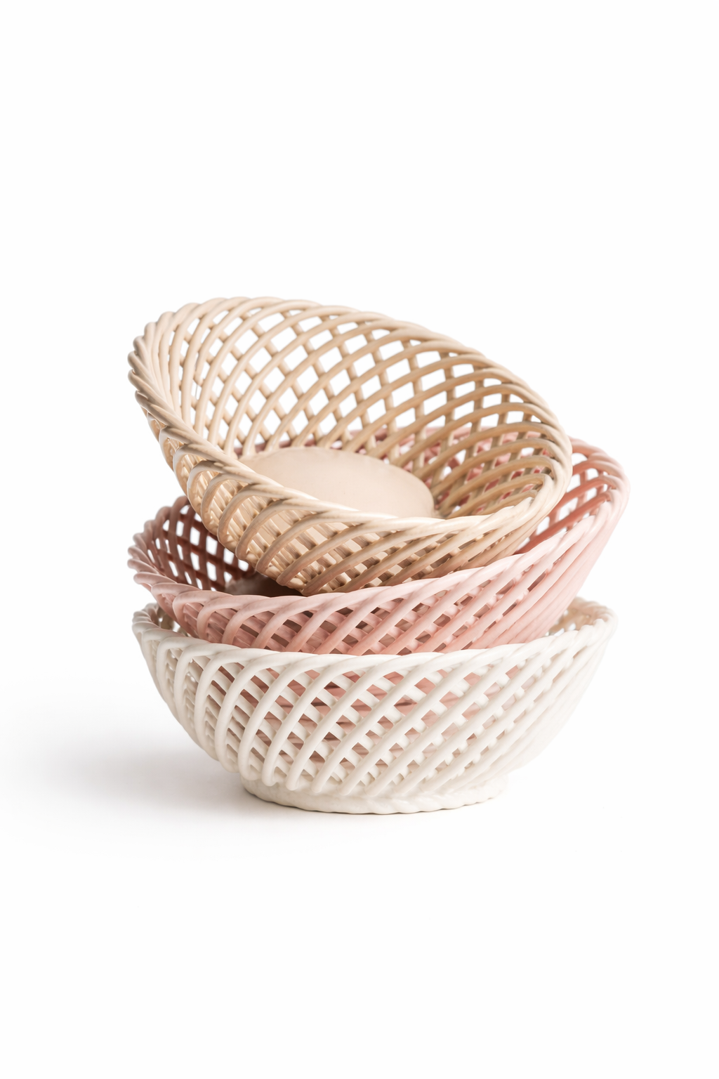 Hand-Woven Ceramic Basket set of three glossy porcelain oval dishes in beige, pink and white, with airy woven latticework.