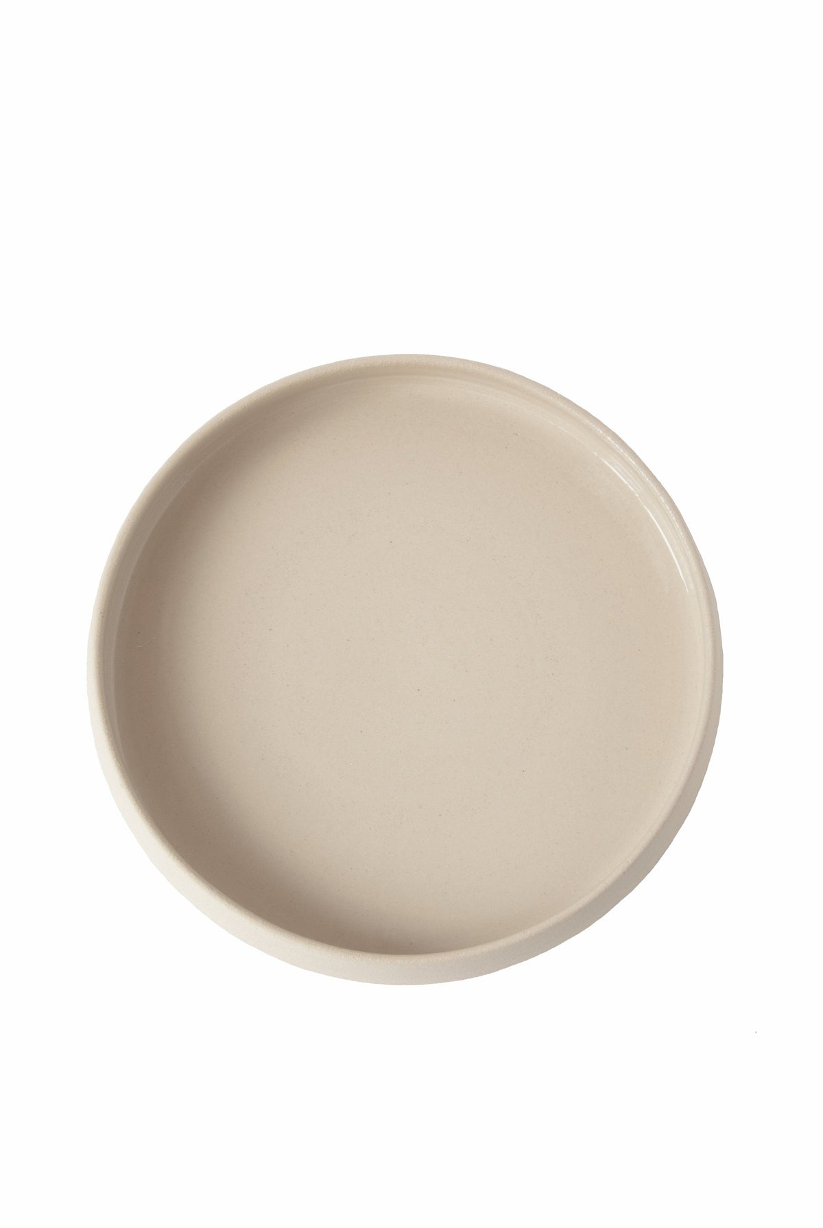 Handmade stoneware dinner plates with high sides and transparent glaze, rustic texture and glossy interior, dishwasher and microwave safe