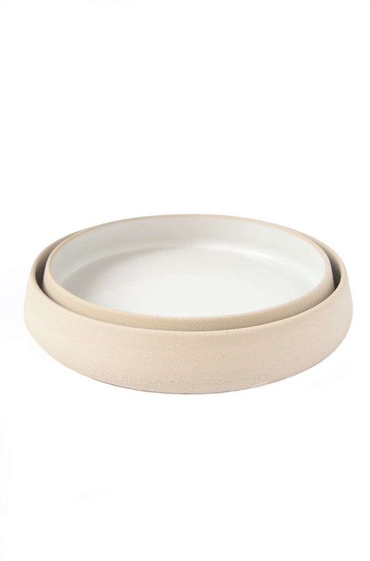 Handmade stoneware dinner plates with high sides and glossy white glaze
